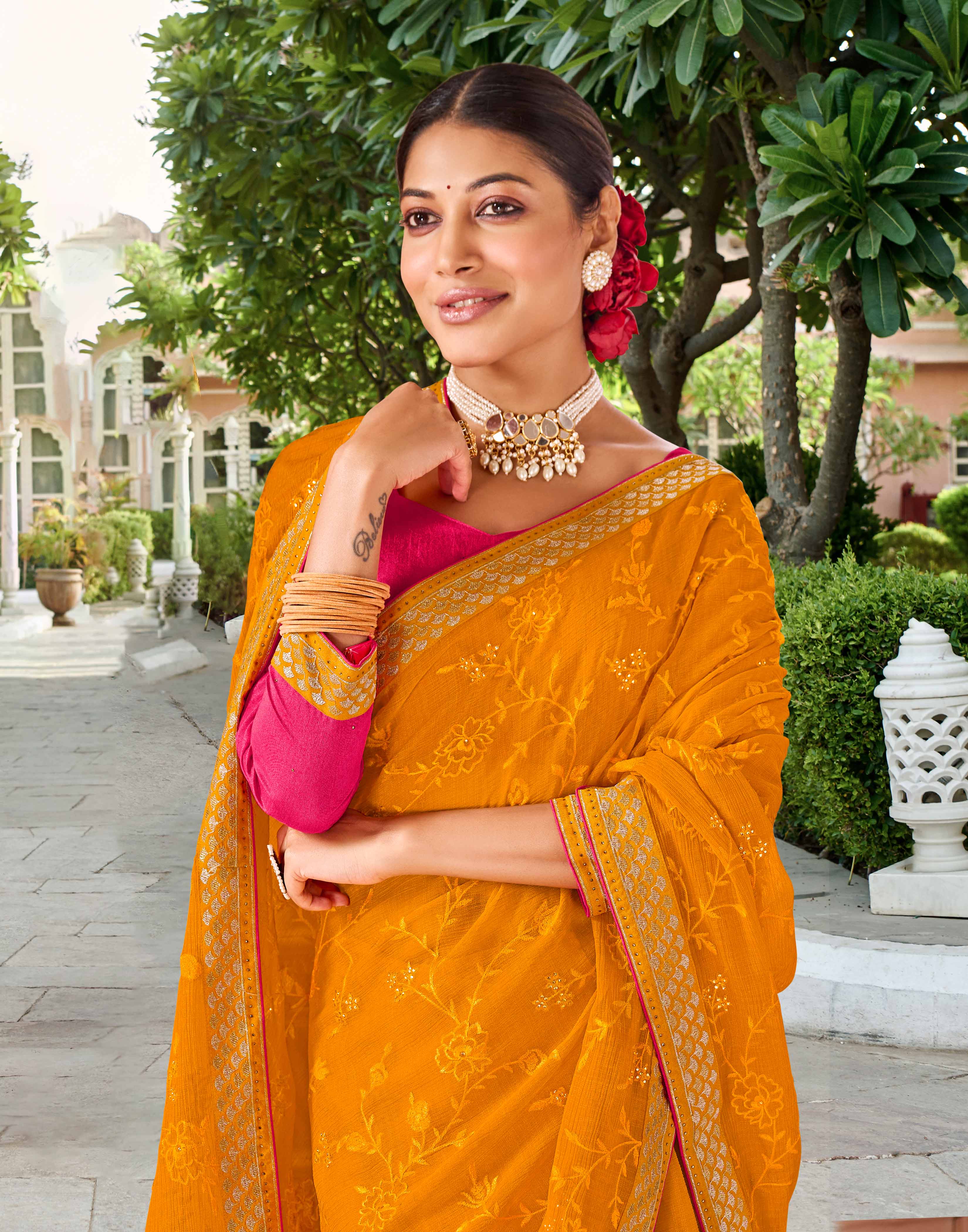 Laxmipati Falooda Floral Embroidered along with Stone Work Chiffon Saree in Orange Color with Unstitched Blouse