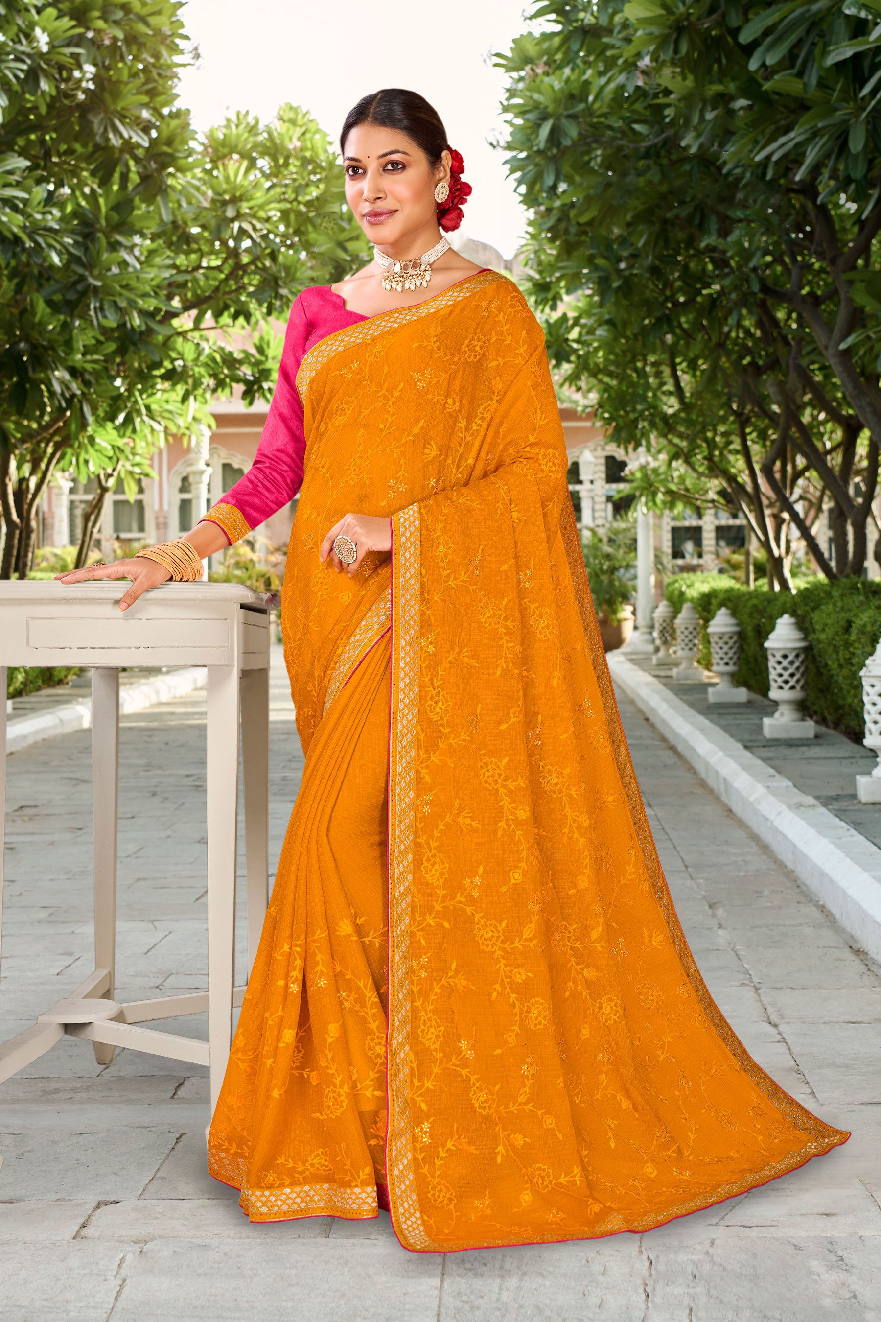 Laxmipati Falooda Floral Embroidered along with Stone Work Chiffon Saree in Orange Color with Unstitched Blouse