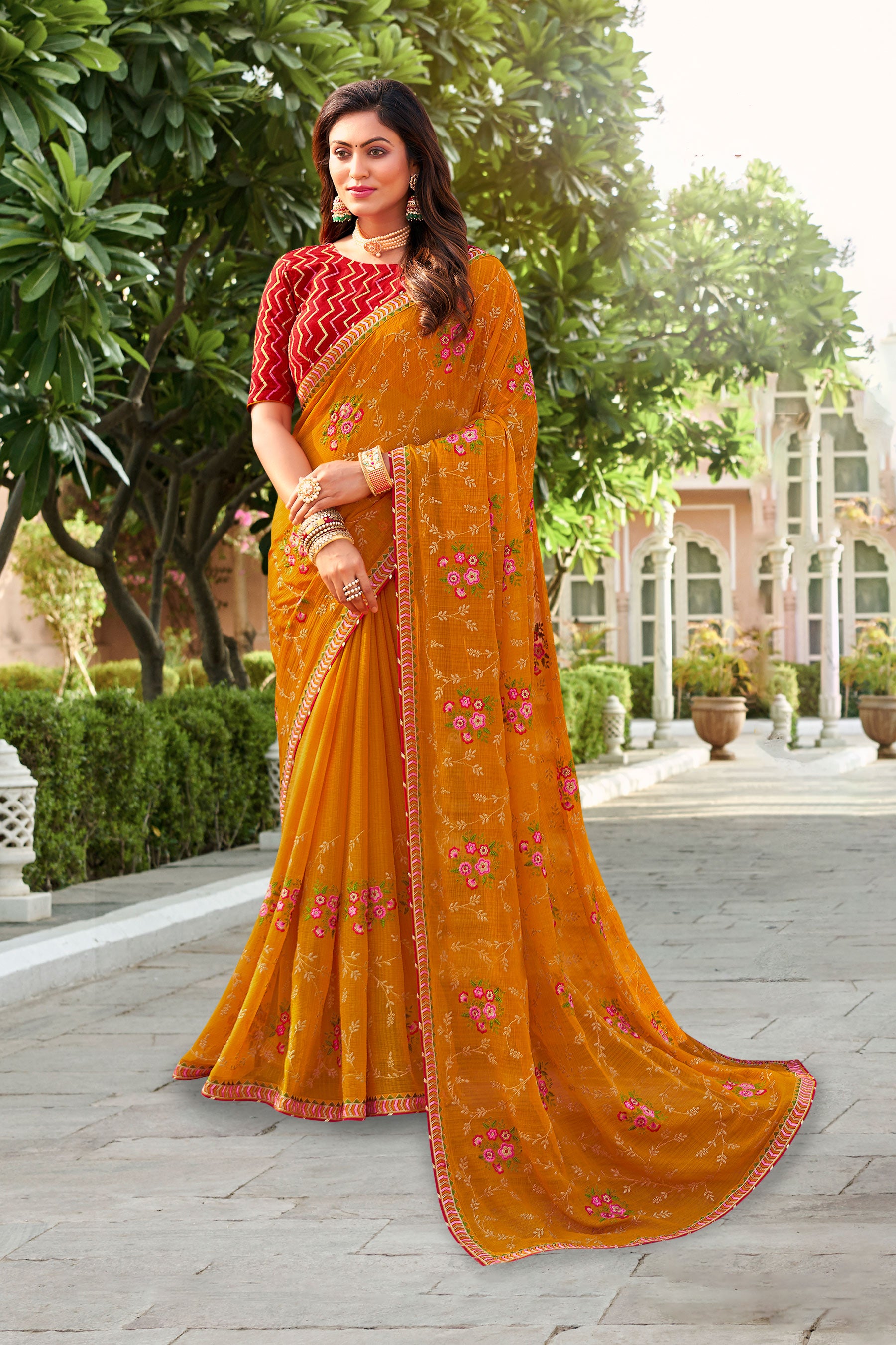 Laxmipati Falooda Floral Embroidered along with Zari and Stone Work Chiffon Saree in Orange Color with Unstitched Blouse
