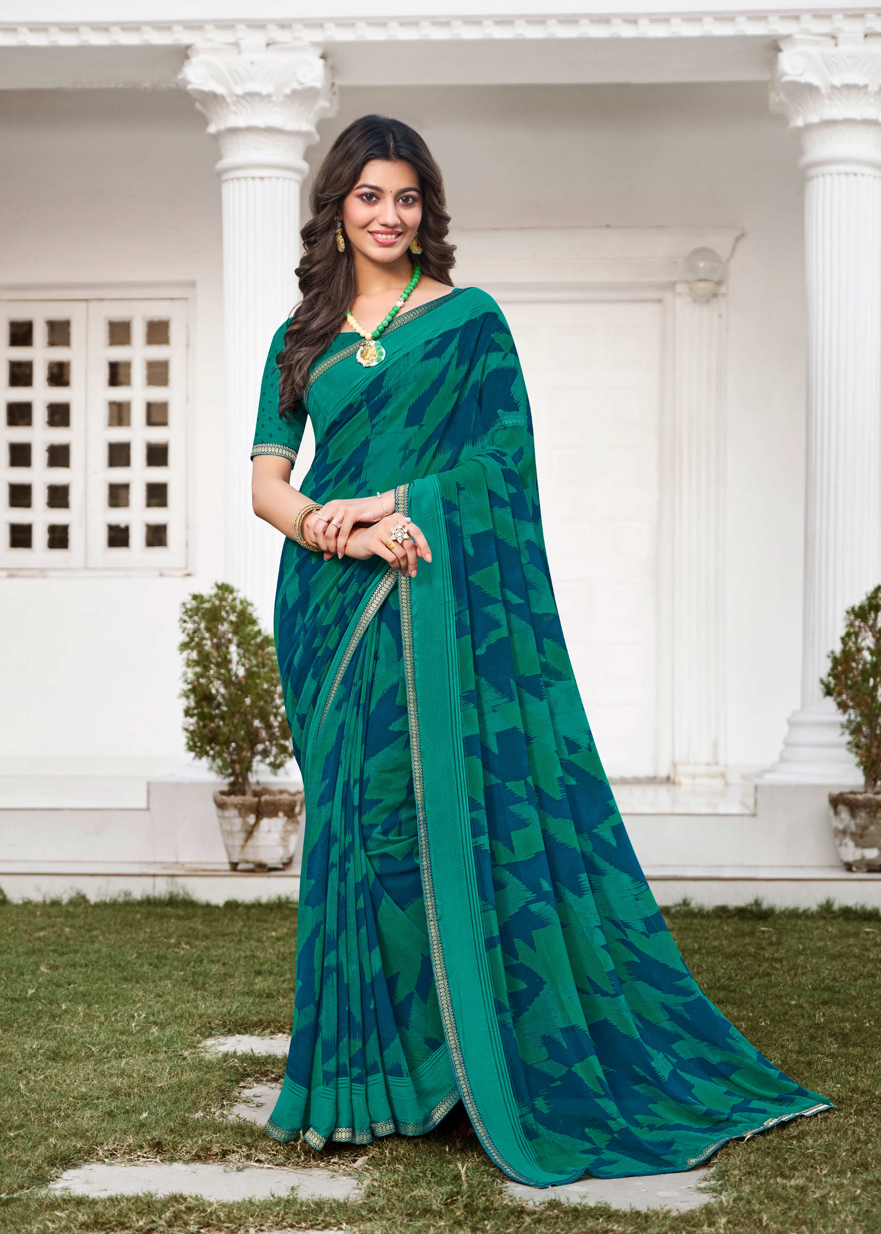 Turquoise Abstract Printed Georgette Saree - Zoya