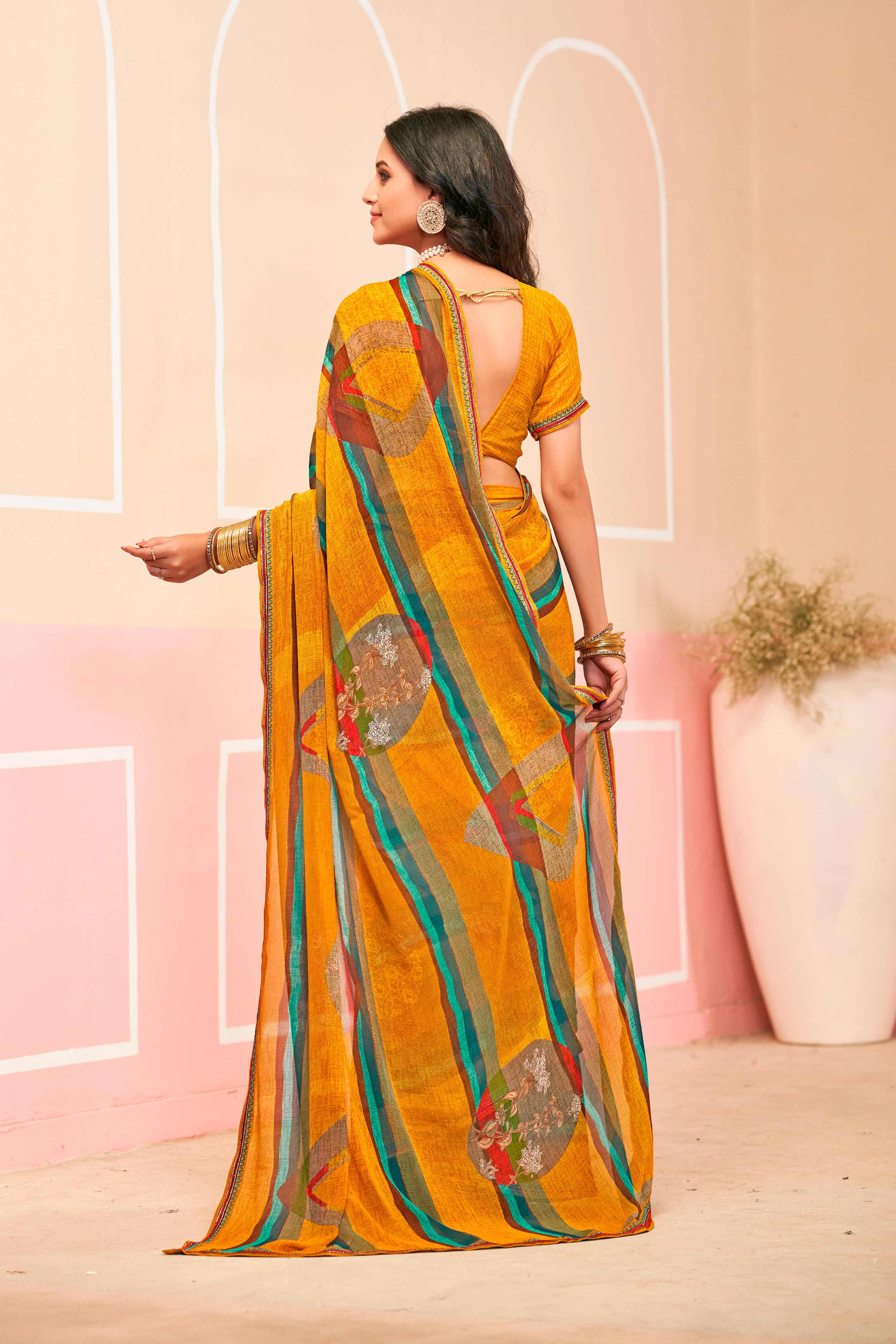 Laxmipati Honey Bunny Abstract Floral Printed Georgette Saree in Mustard Color with Unstitched Blouse