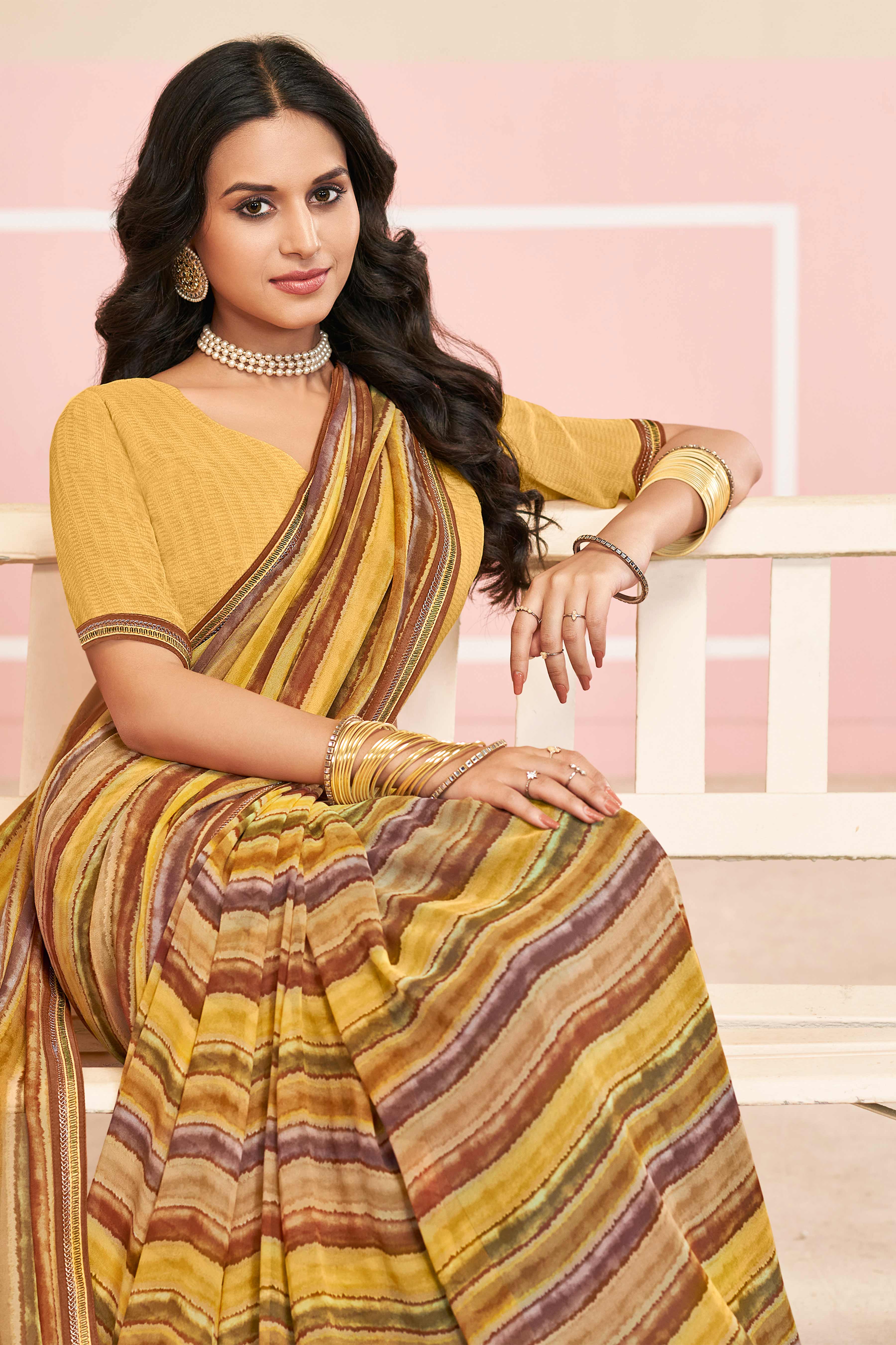 Laxmipati Honey Bunny Horizontal Pinstripes Printed Georgette Saree in Brown Color with Unstitched Blouse