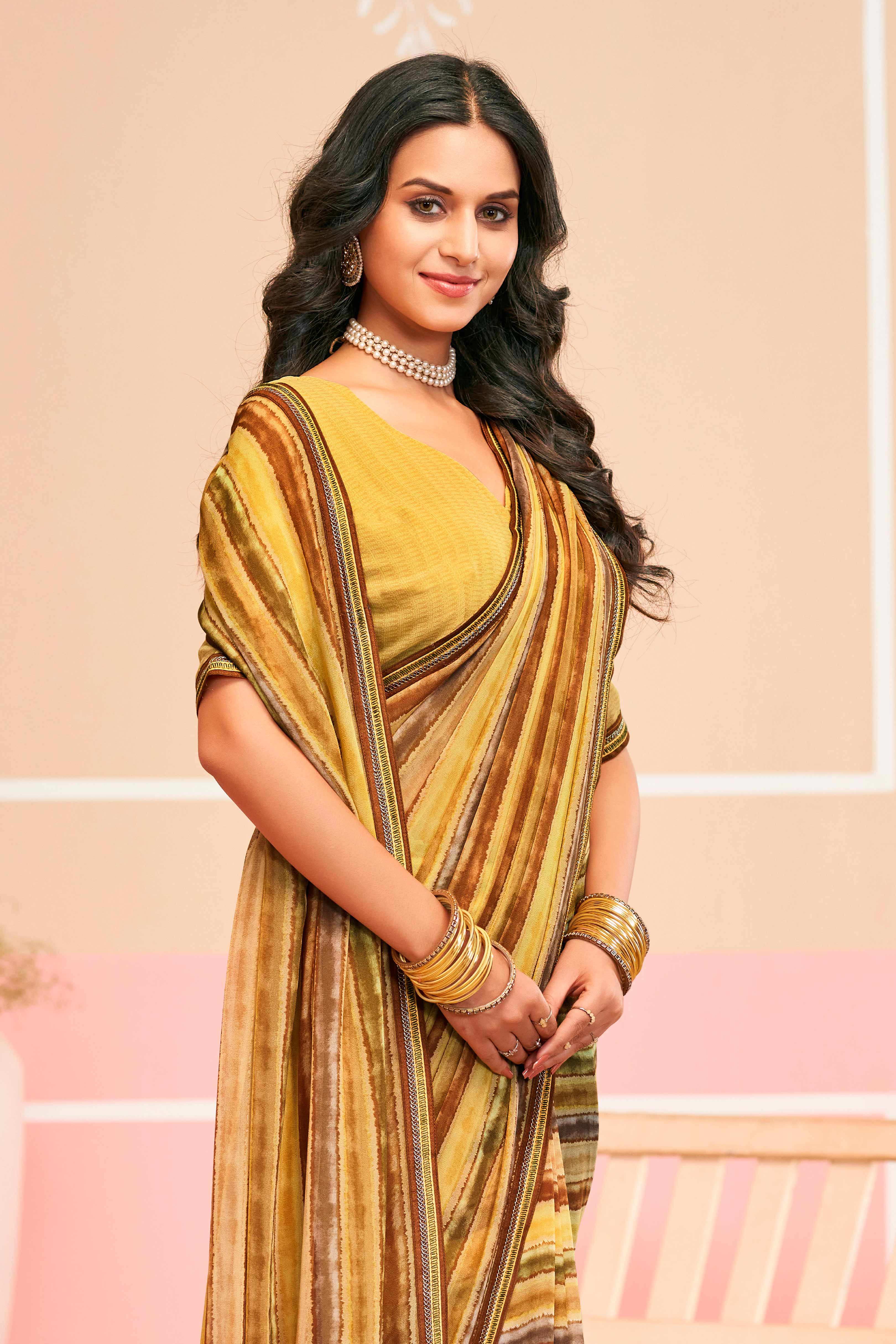 Laxmipati Honey Bunny Horizontal Pinstripes Printed Georgette Saree in Brown Color with Unstitched Blouse