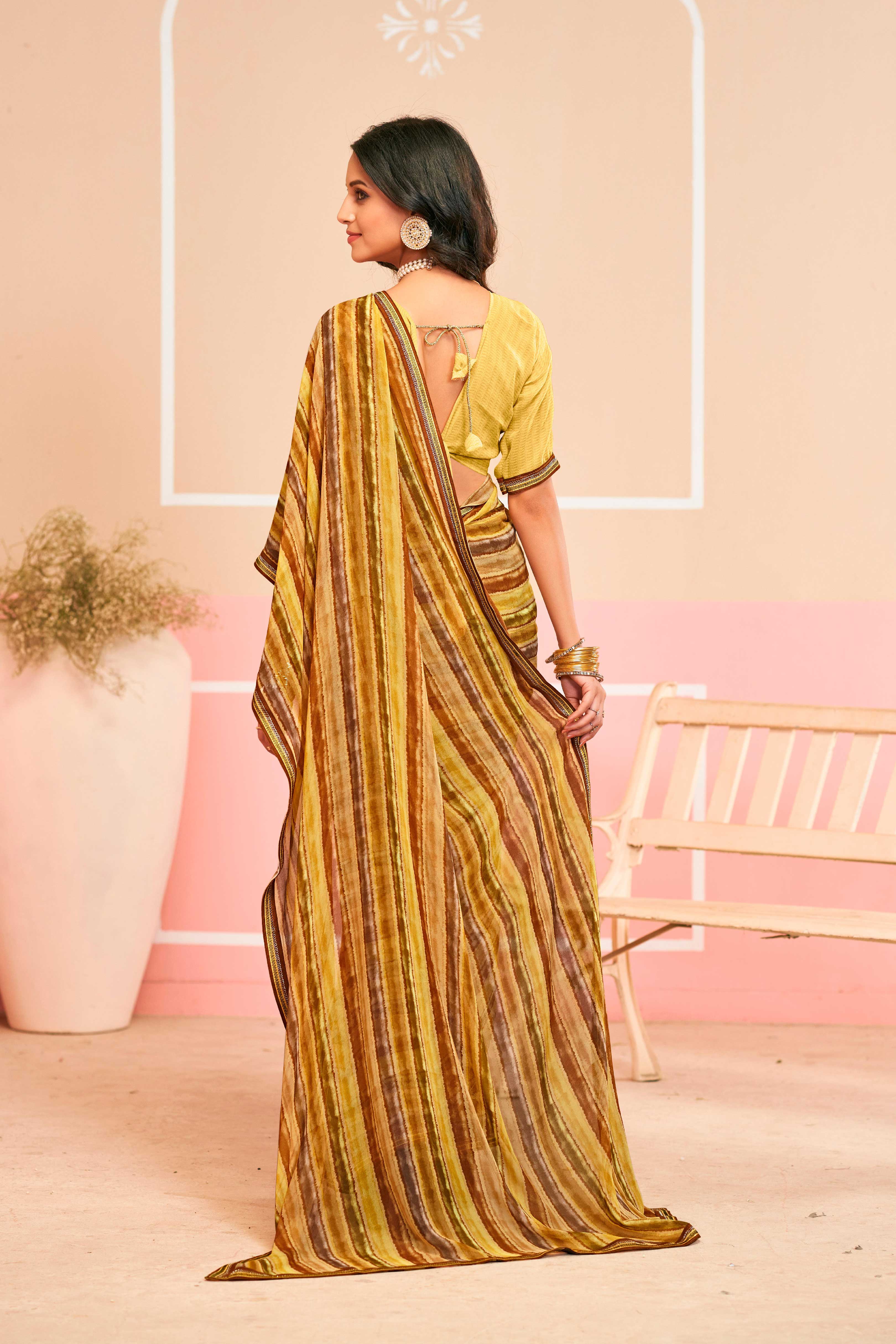 Laxmipati Honey Bunny Horizontal Pinstripes Printed Georgette Saree in Brown Color with Unstitched Blouse