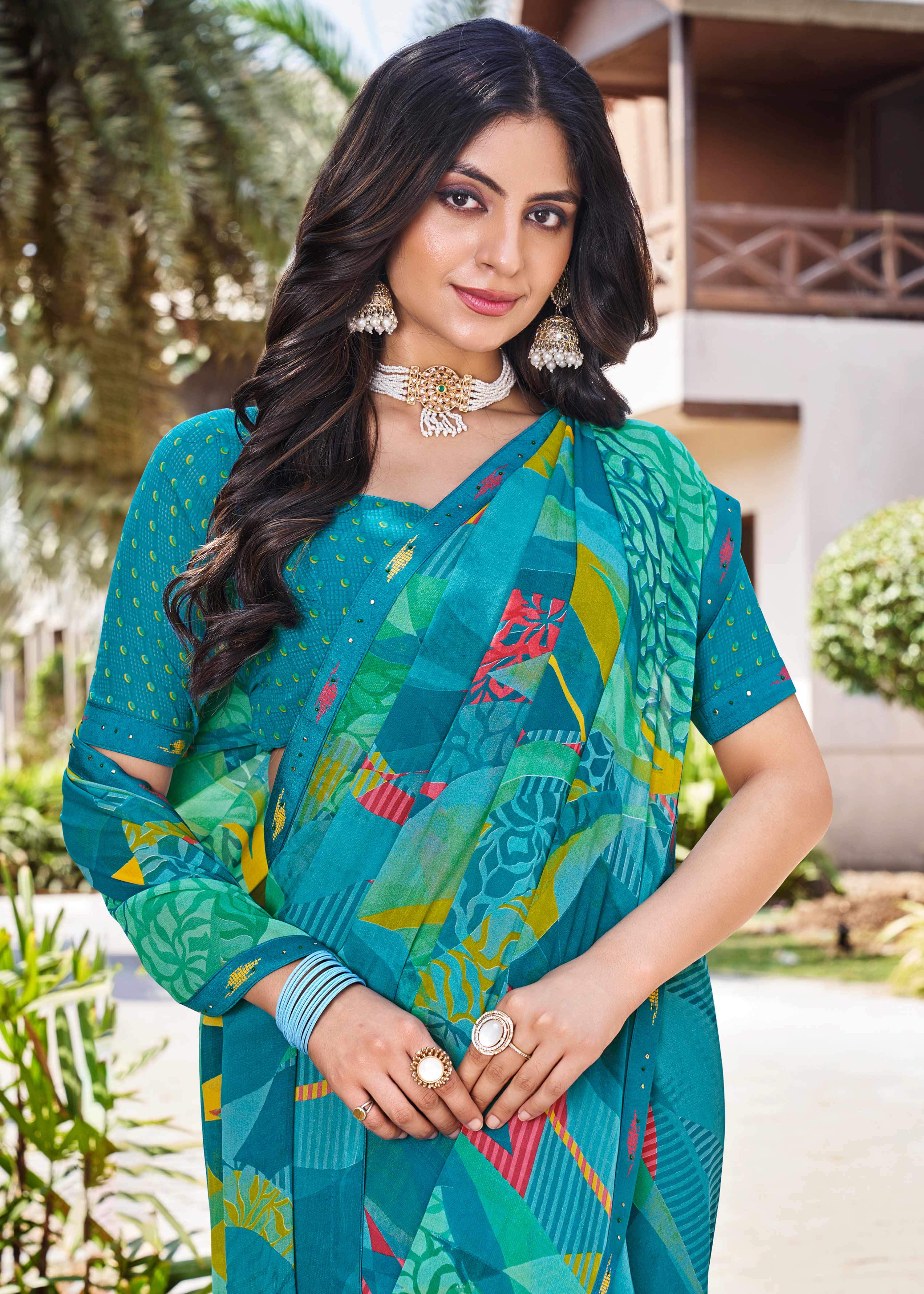 Laxmipati Noori-2 Abstract Printed Georgette Saree in Blue Color with Unstitched Blouse