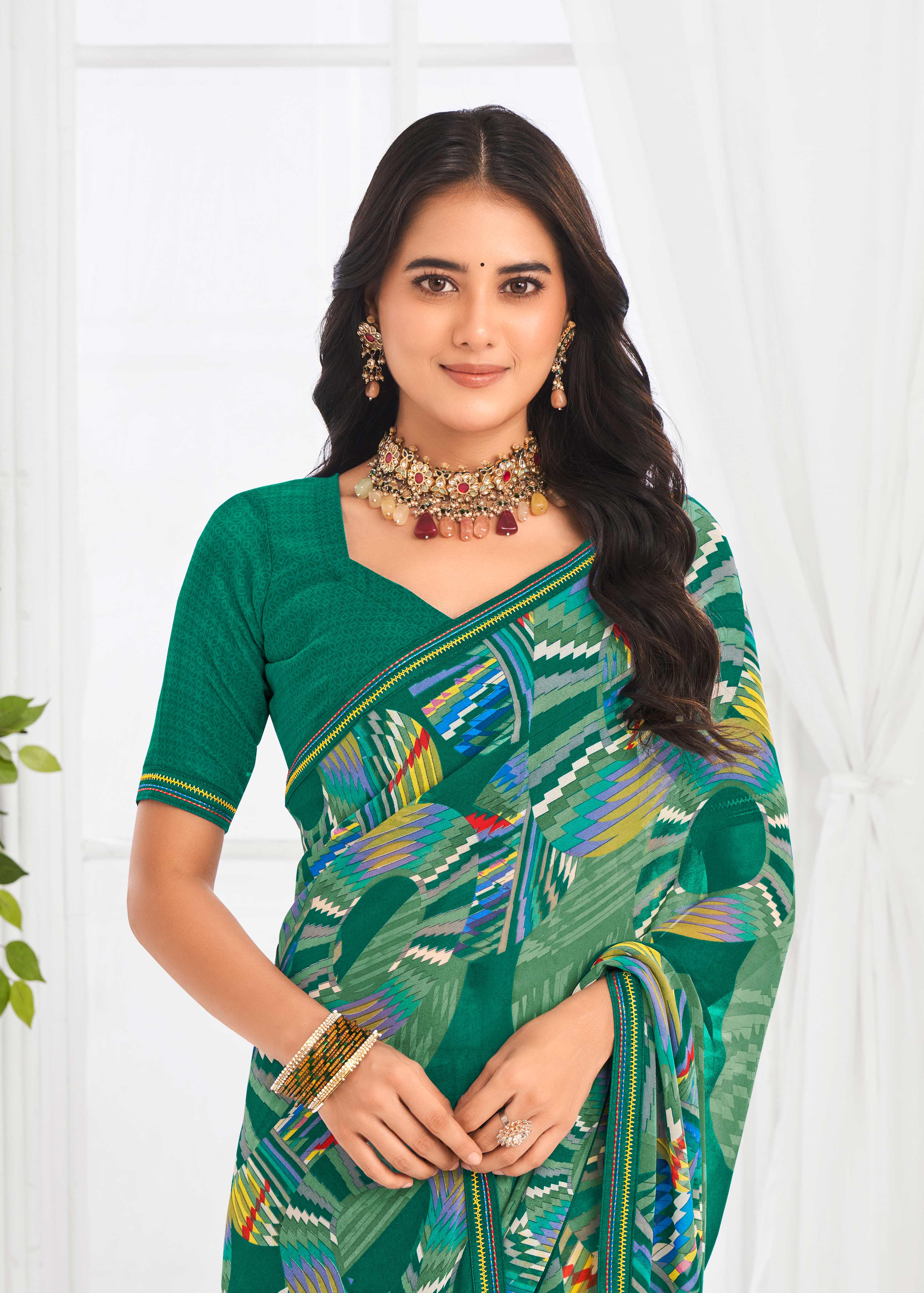 Laxmipati Jaayaphal Teal Green Geometric Georgette Printed Saree