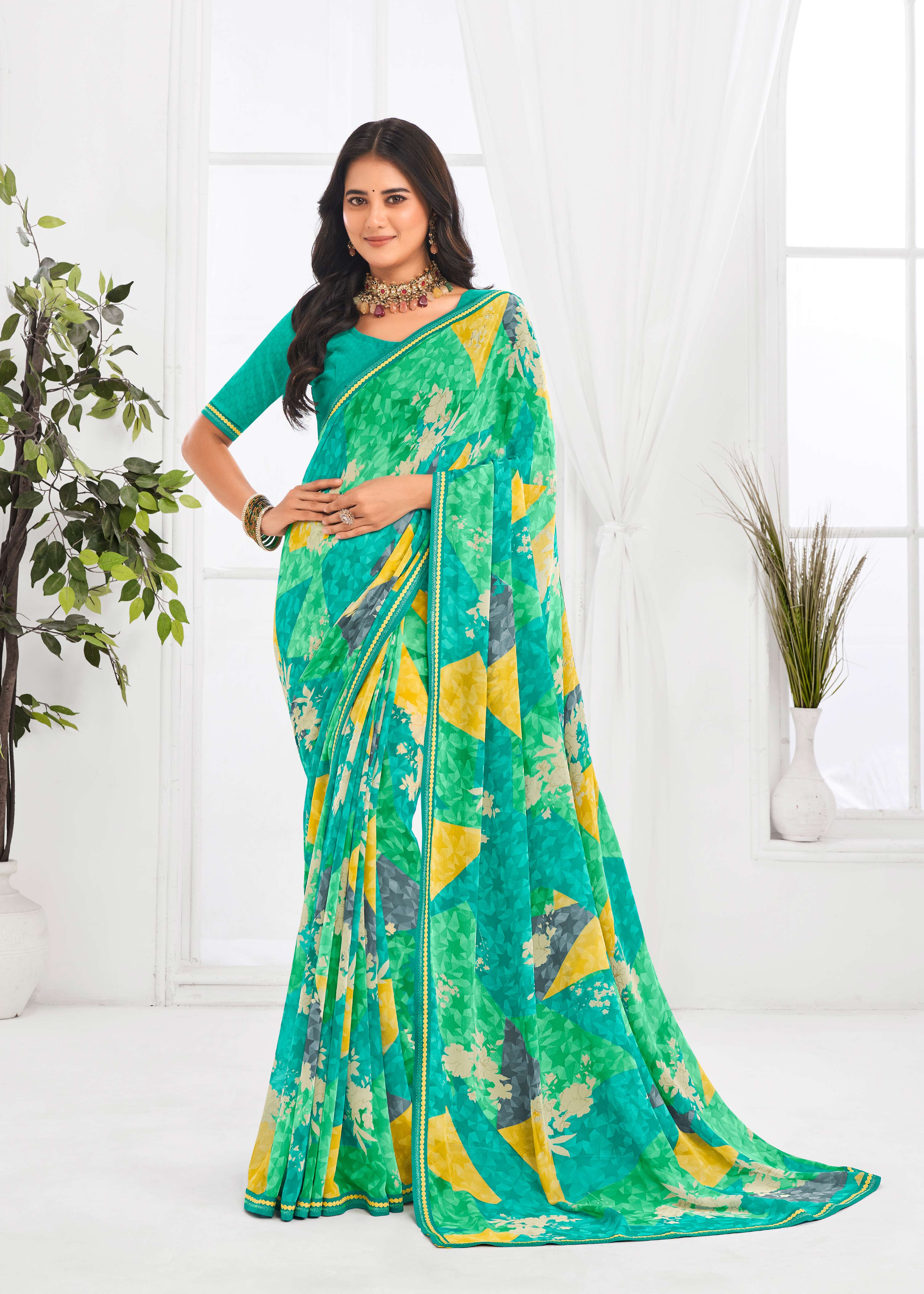 Laxmipati Jaayaphal Teal Green Floral Georgette Printed Saree
