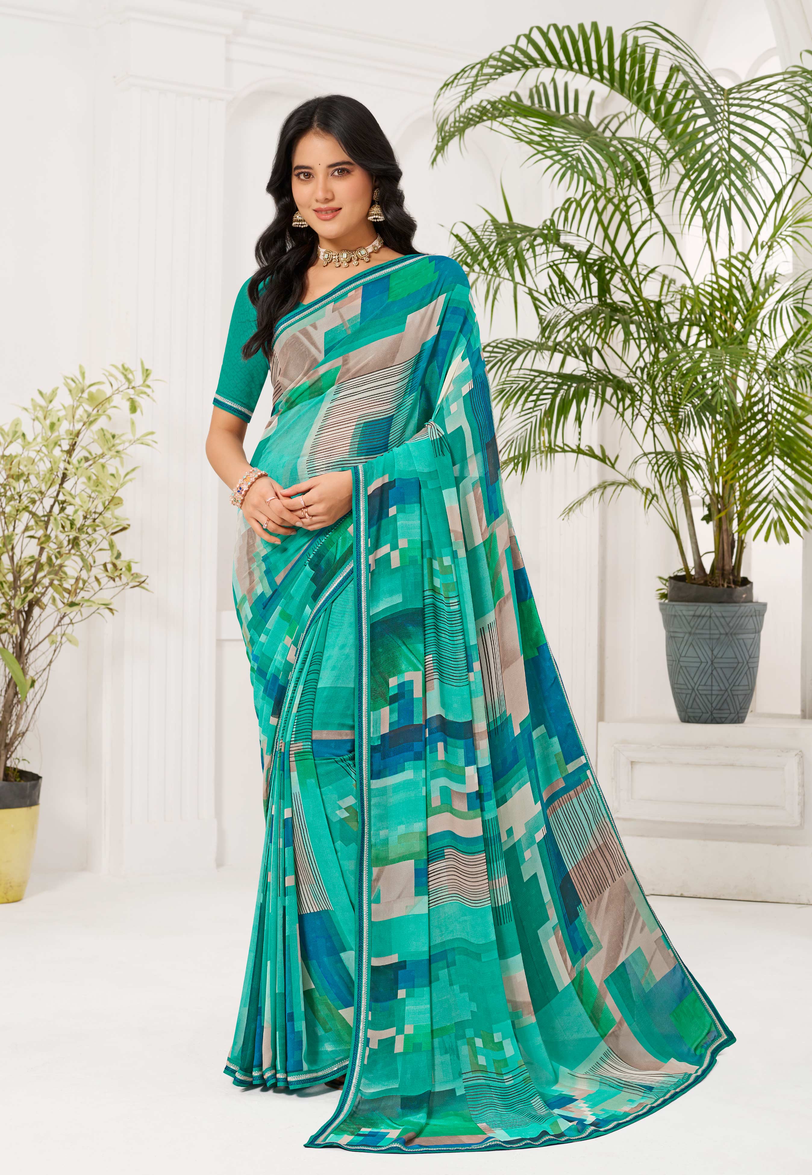 Laxmipati Radha Rani Abstract Georgette Printed Saree in Teal Blue Color