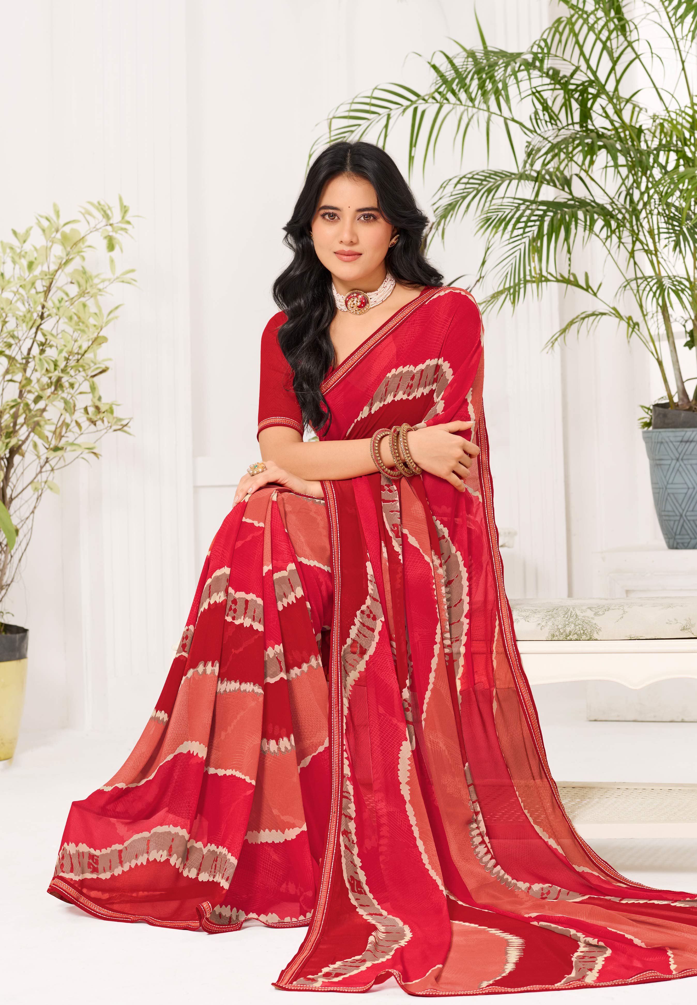 Laxmipati Radha Rani Abstract Georgette Printed Saree in Red Color