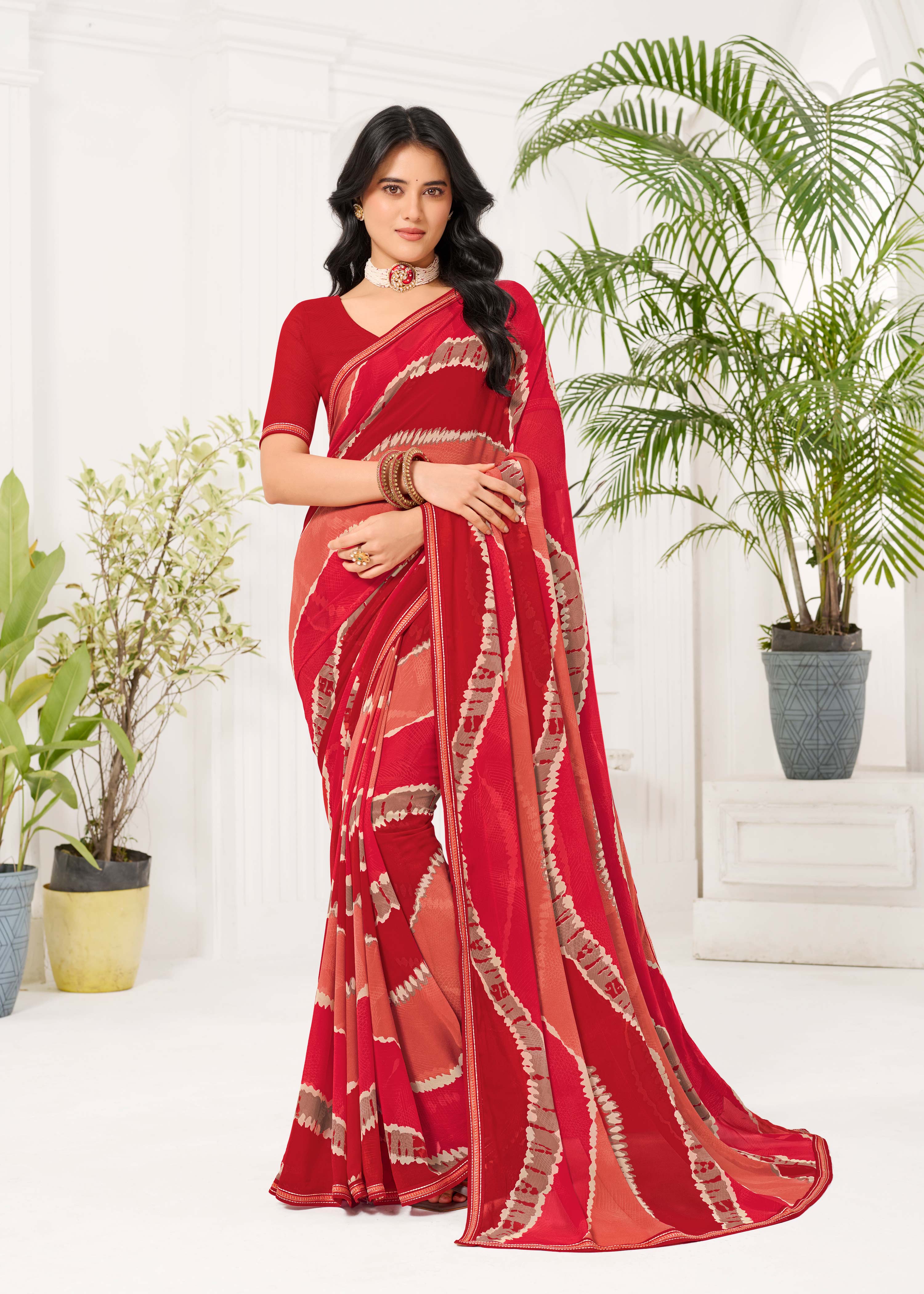 Laxmipati Radha Rani Abstract Georgette Printed Saree in Red Color