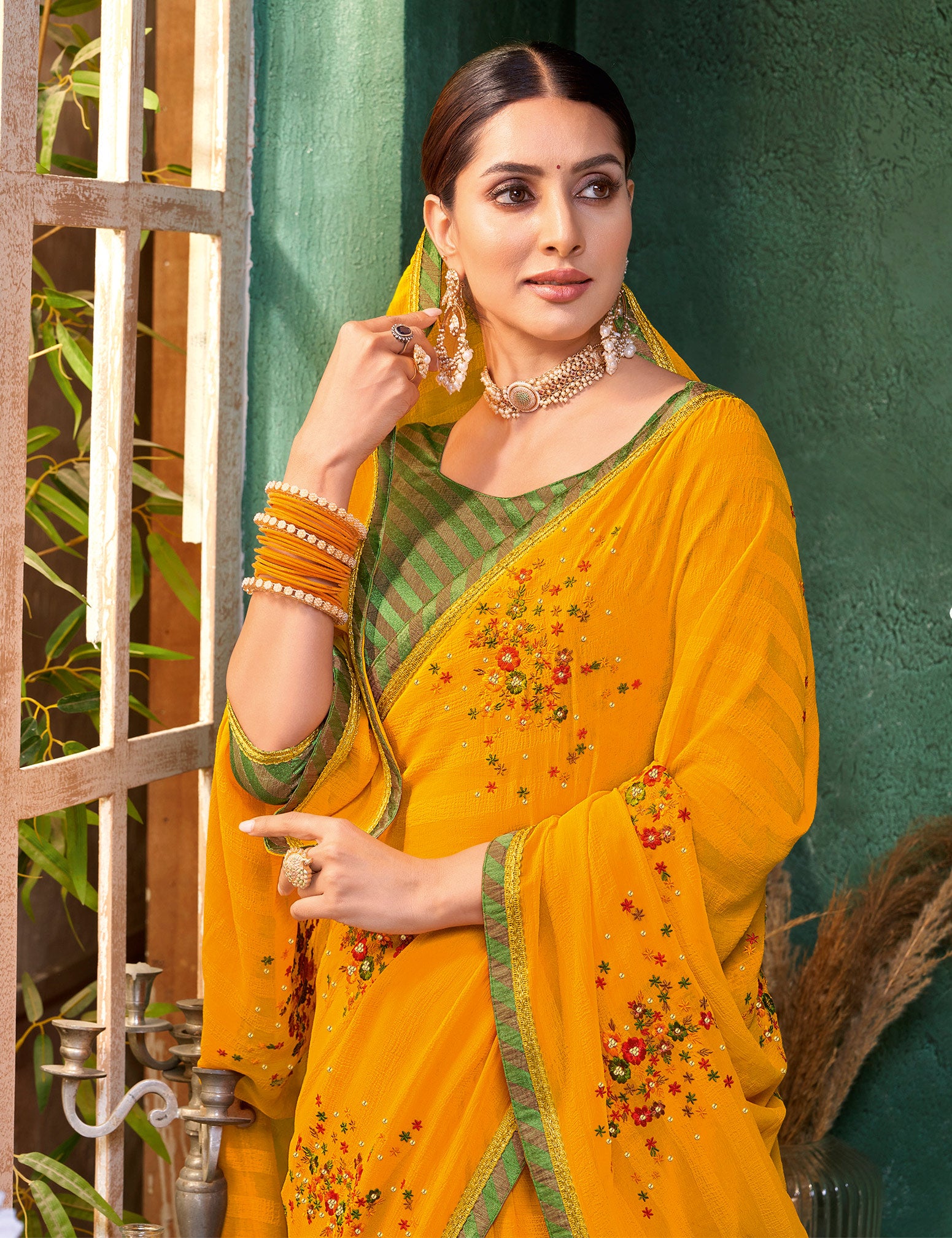 Laxmipati Mangla Gauri Mustard Georgette Saree with Floral Embroidery