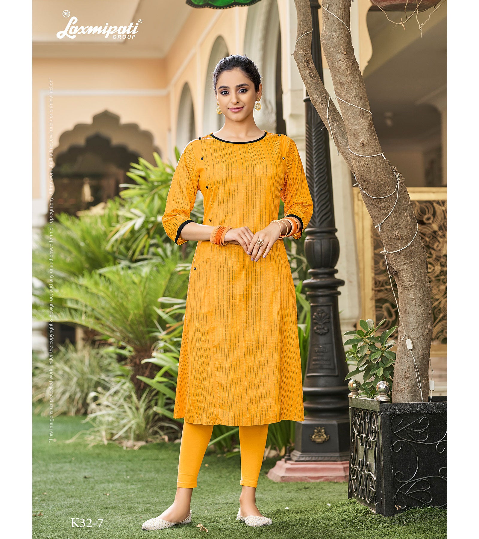 Laxmipati Spun Base Self Textured Gold Kurti