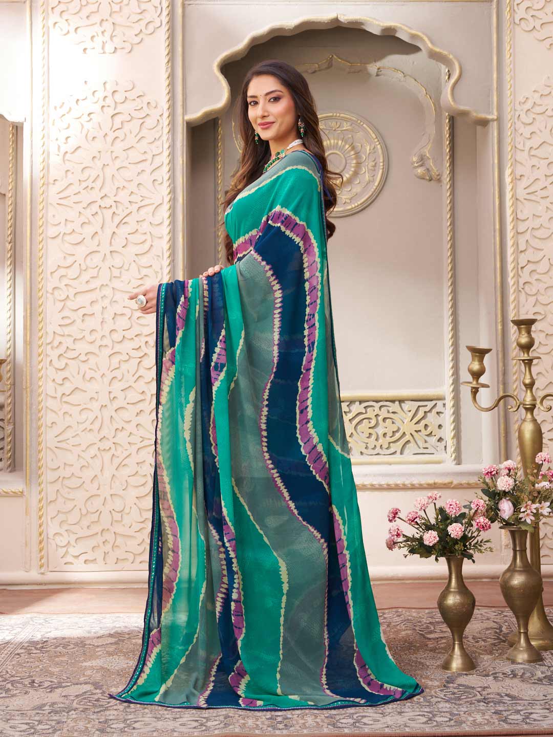 Laxmipati Limca Teal Green Georgette Wavy Printed Saree
