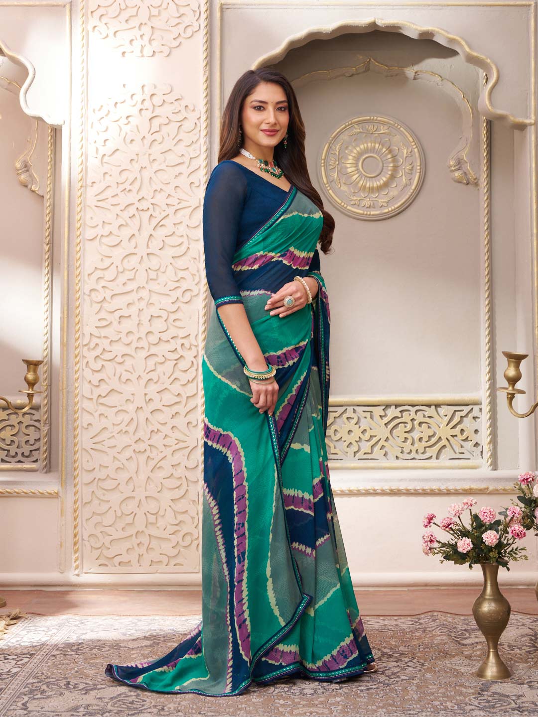 Laxmipati Limca Teal Green Georgette Wavy Printed Saree