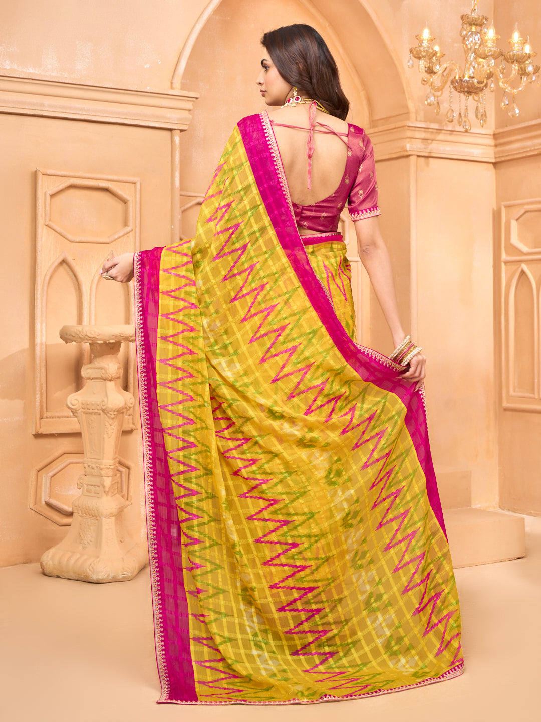 Laxmipati Tohfa Ikkat Printed Chiffon Saree in Yellow Color