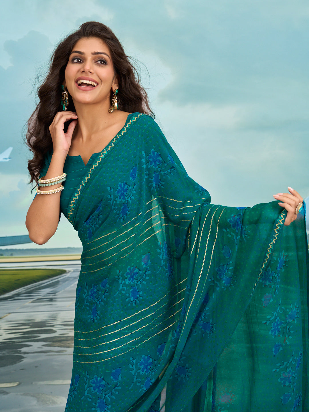 Laxmipati Raadhika Teal Blue Floral Print Georgette Saree