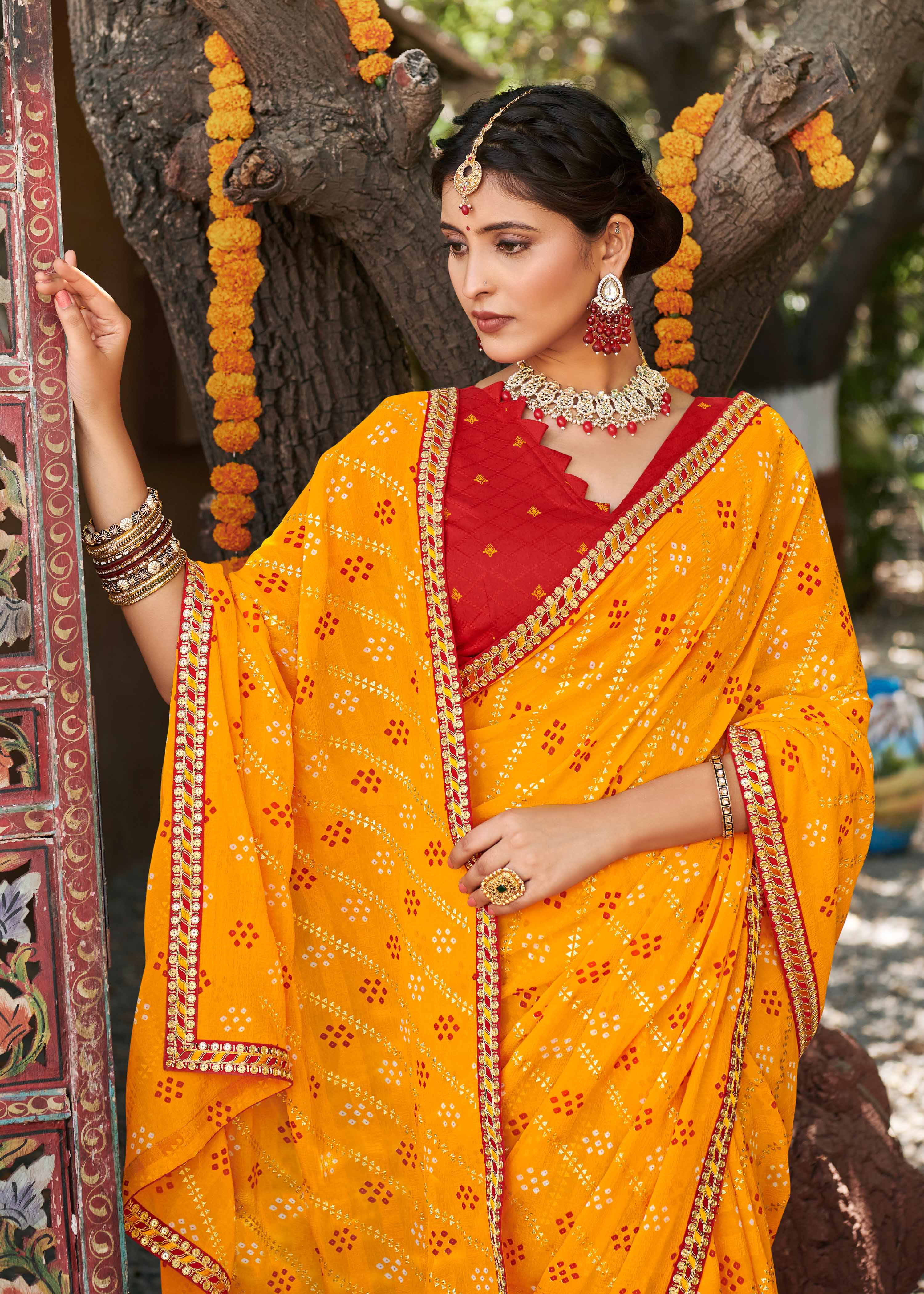 Laxmipati Rajwadi Bandhani Printed Georgette Saree in Orange Color with Unstitched Blouse