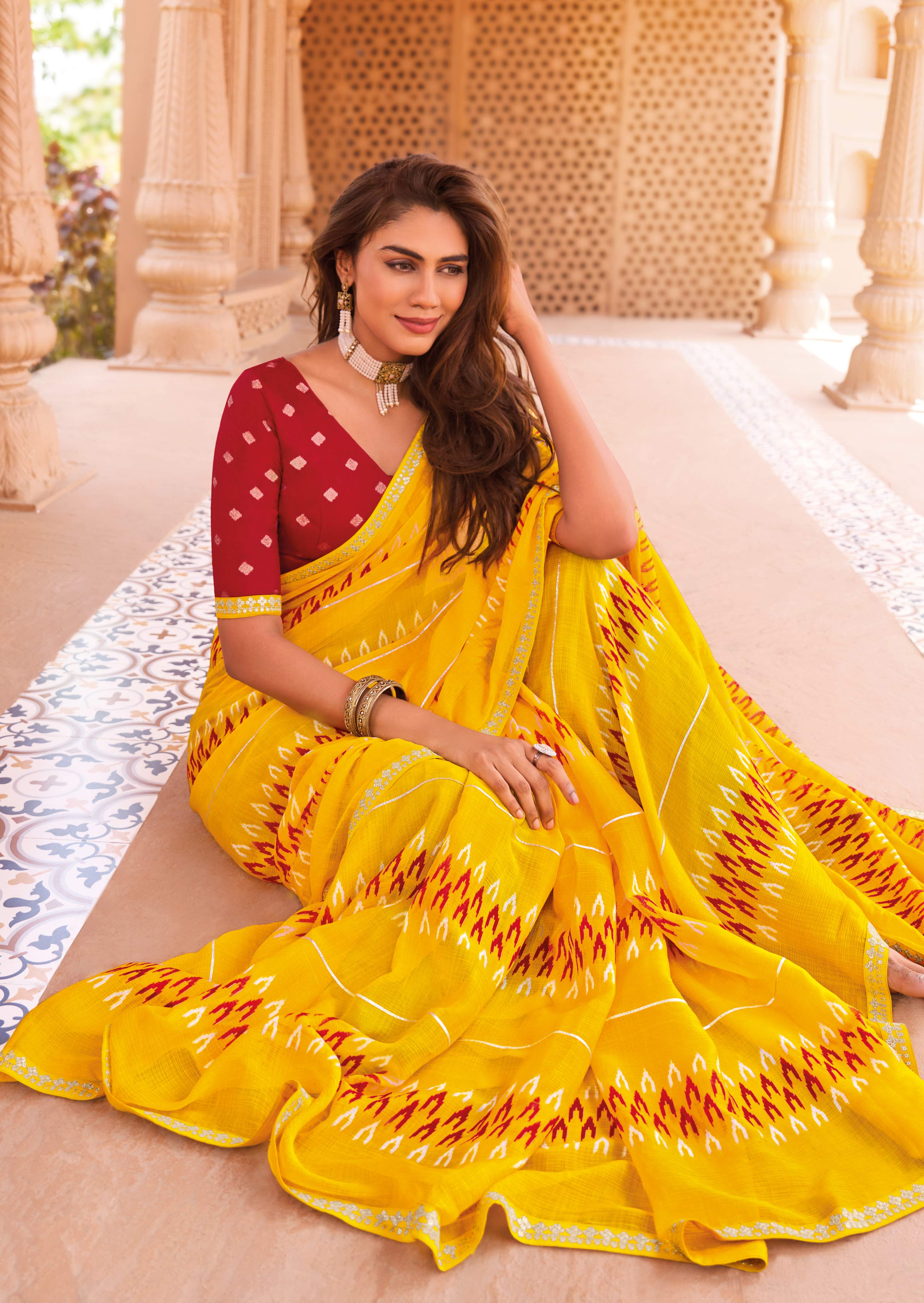 Laxmipati Madhubala Ikkat Printed Chiffon Saree in Yellow Color with Unstitched Blouse