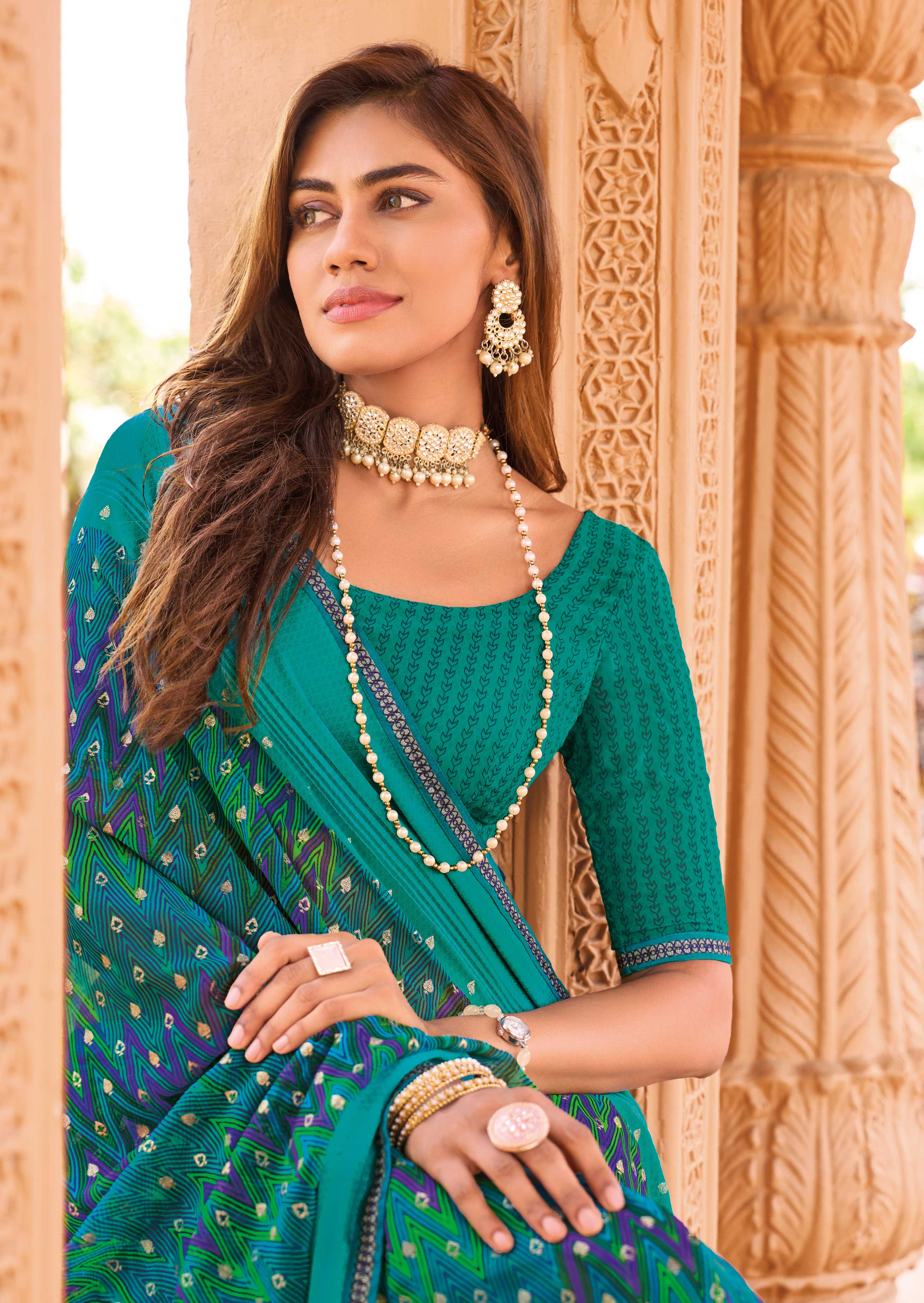 Laxmipati Madhubala Chevron Printed Georgette Saree in Teal Blue Color with Unstitched Blouse