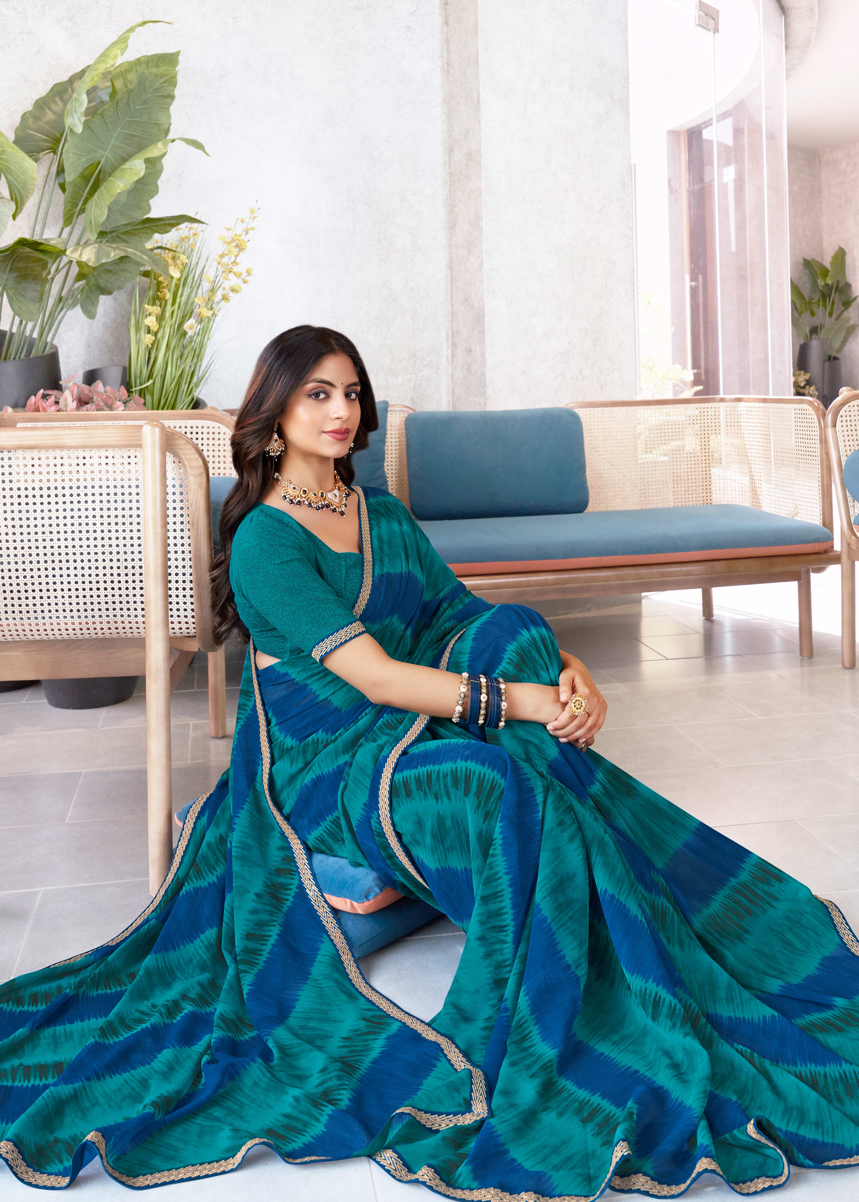 Laxmipati Mala Diagonal Striped Printed Georgette Saree in Teal Blue Color with Unstitched Blouse