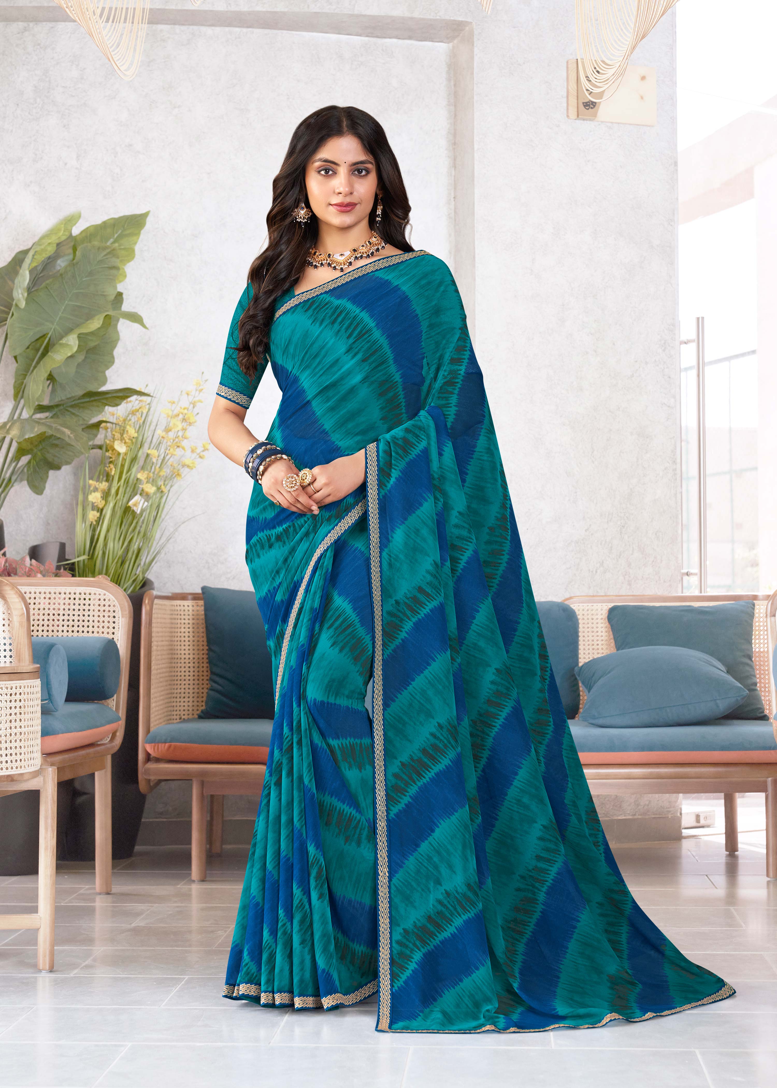 Laxmipati Mala Diagonal Striped Printed Georgette Saree in Teal Blue Color with Unstitched Blouse