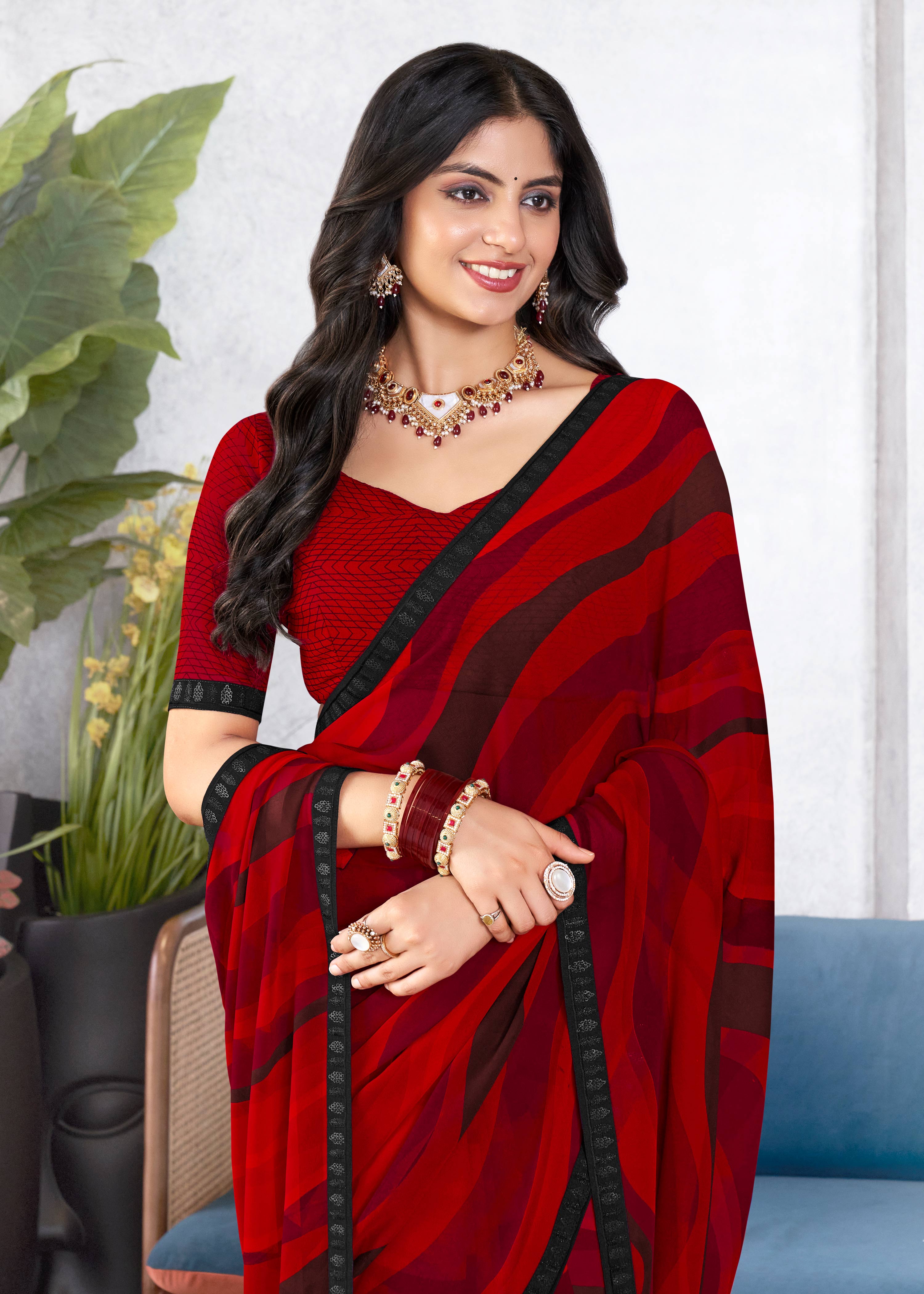 Laxmipati Mala Abstract Wave Printed Georgette Saree in Red Color with Unstitched Blouse