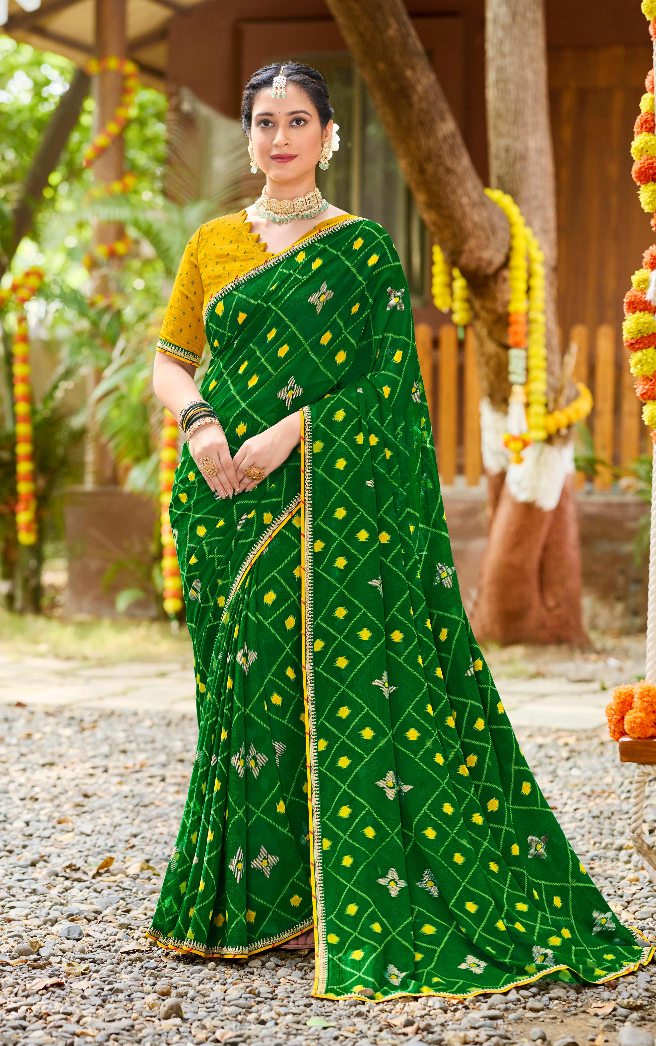 Laxmipati Upavan Ikkat Printed along with Foil Work Georgette Saree in Green Color with Unstitched Blouse