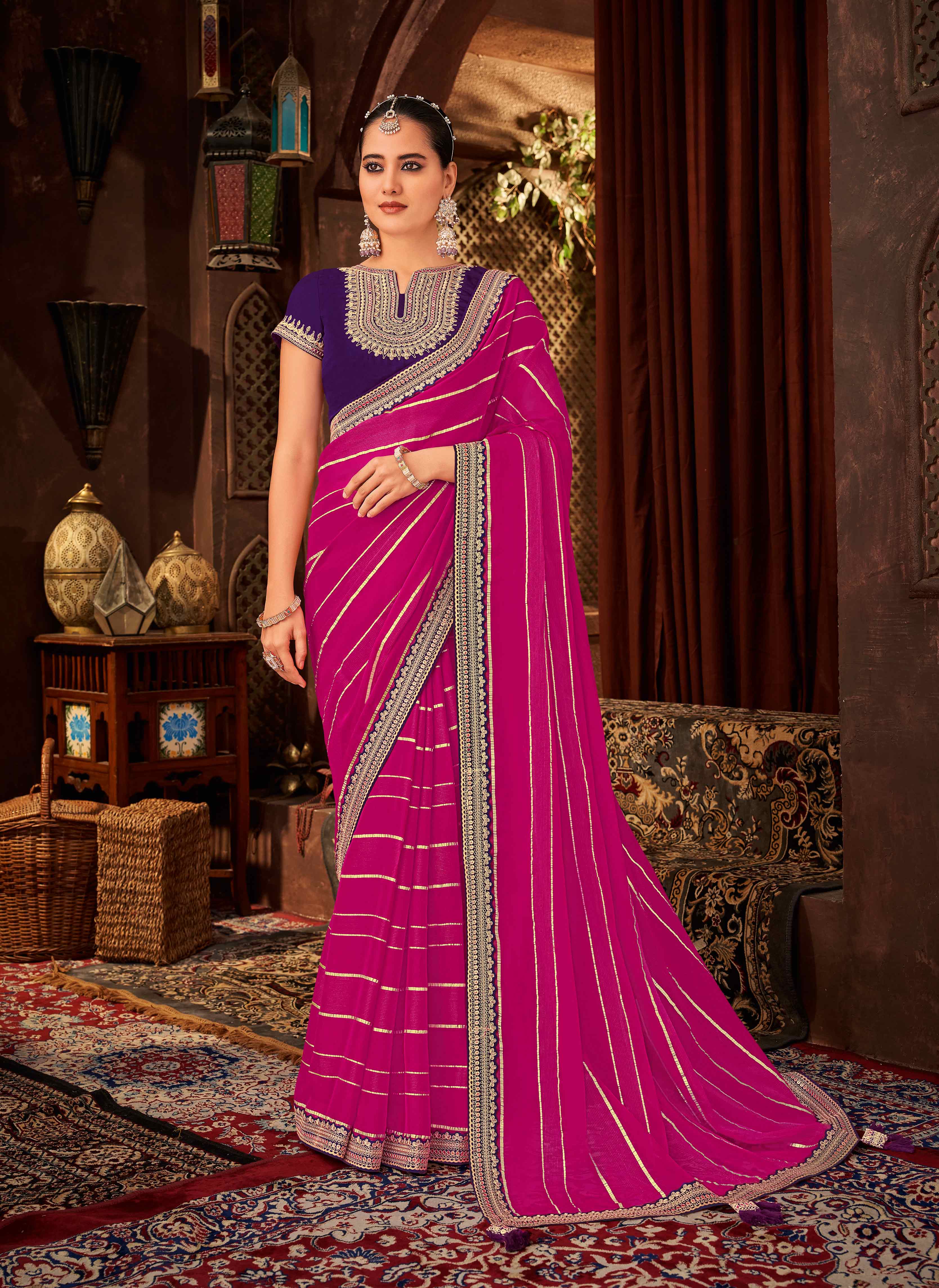 Laxmipati Firki Striped Printed & Zari Lace Border Georgette Saree in Magenta Color with Unstitched Blouse