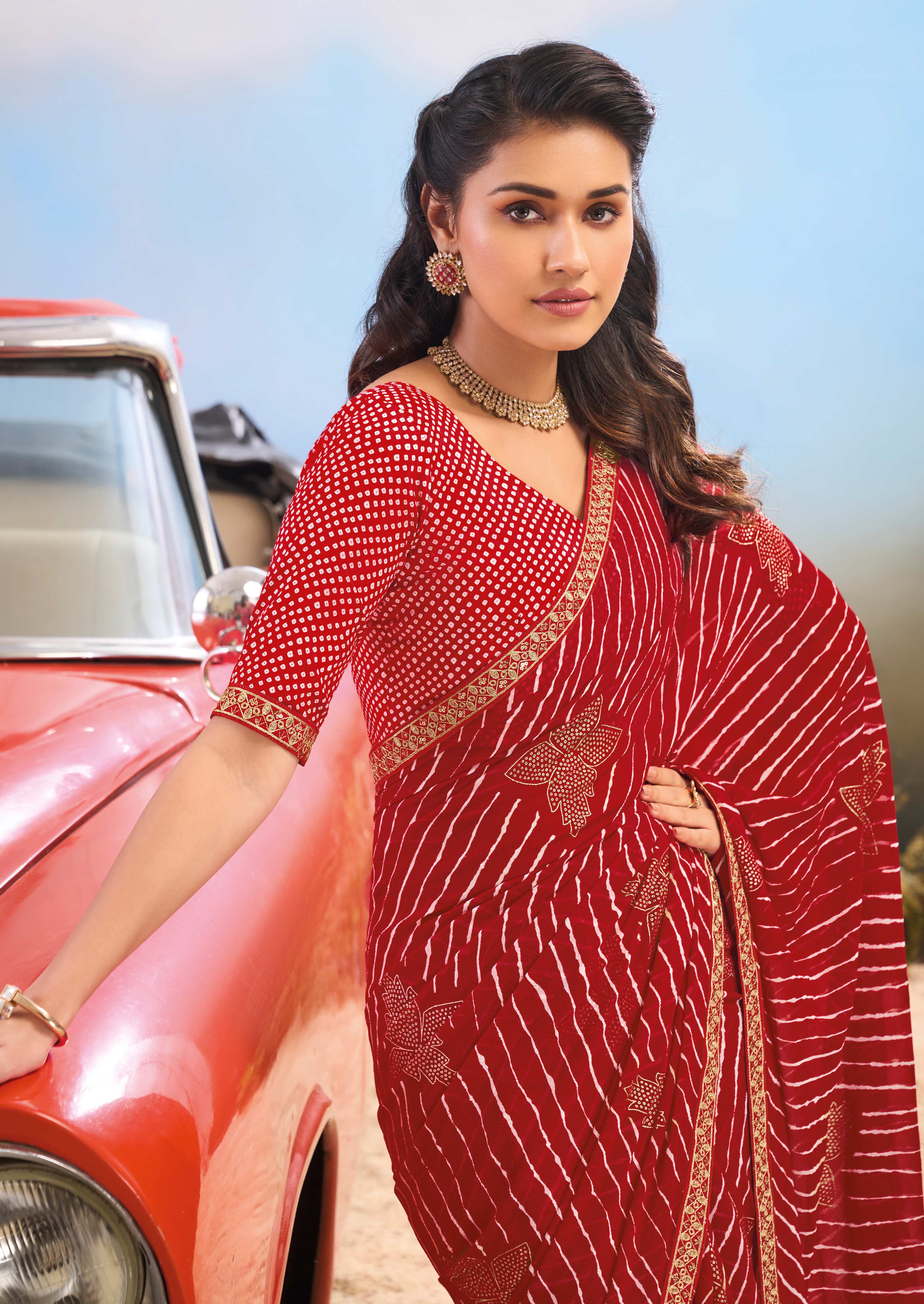 Laxmipati Baarish Striped Printed Georgette Saree in Red Color with Unstitched Blouse