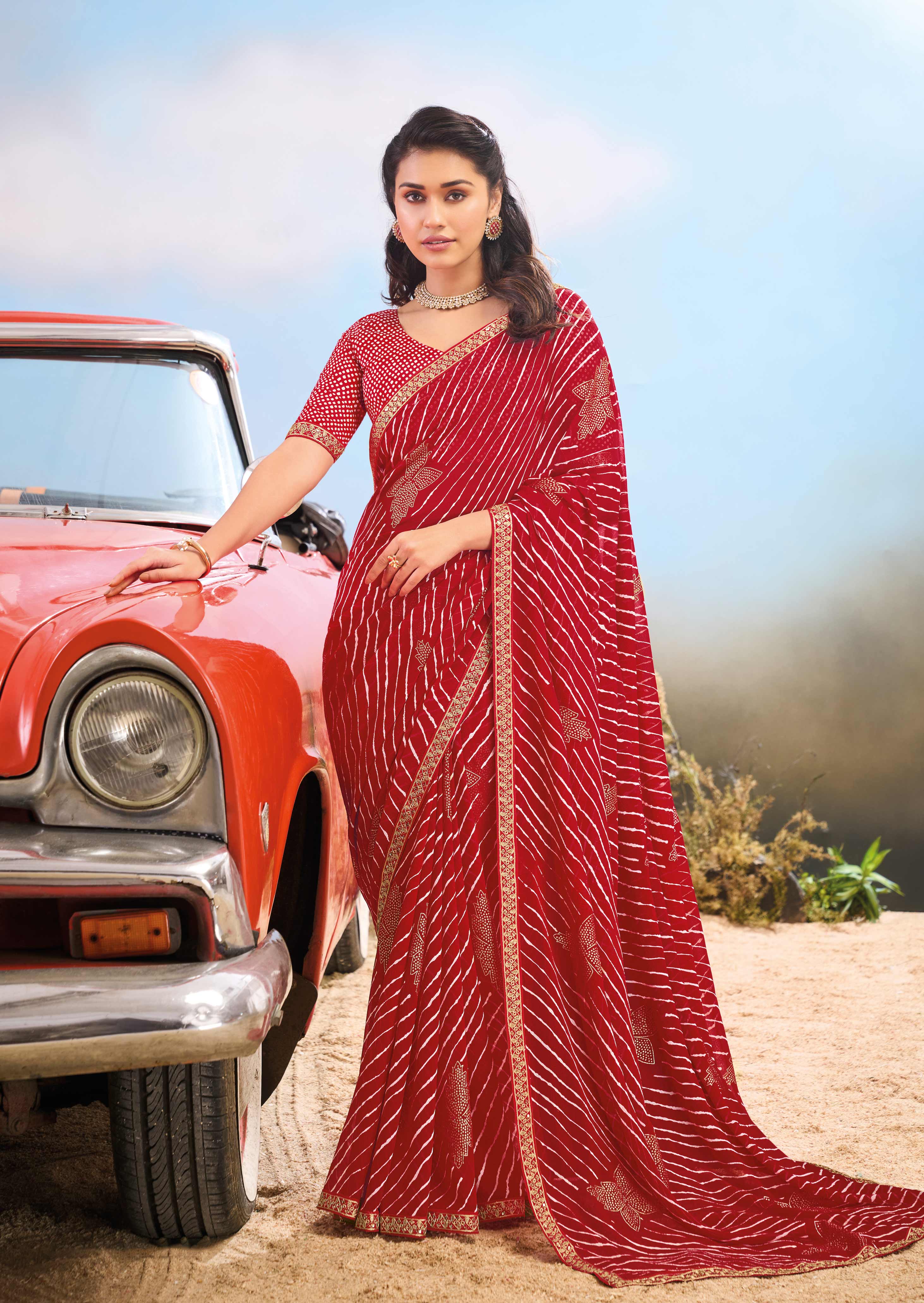 Laxmipati Baarish Striped Printed Georgette Saree in Red Color with Unstitched Blouse