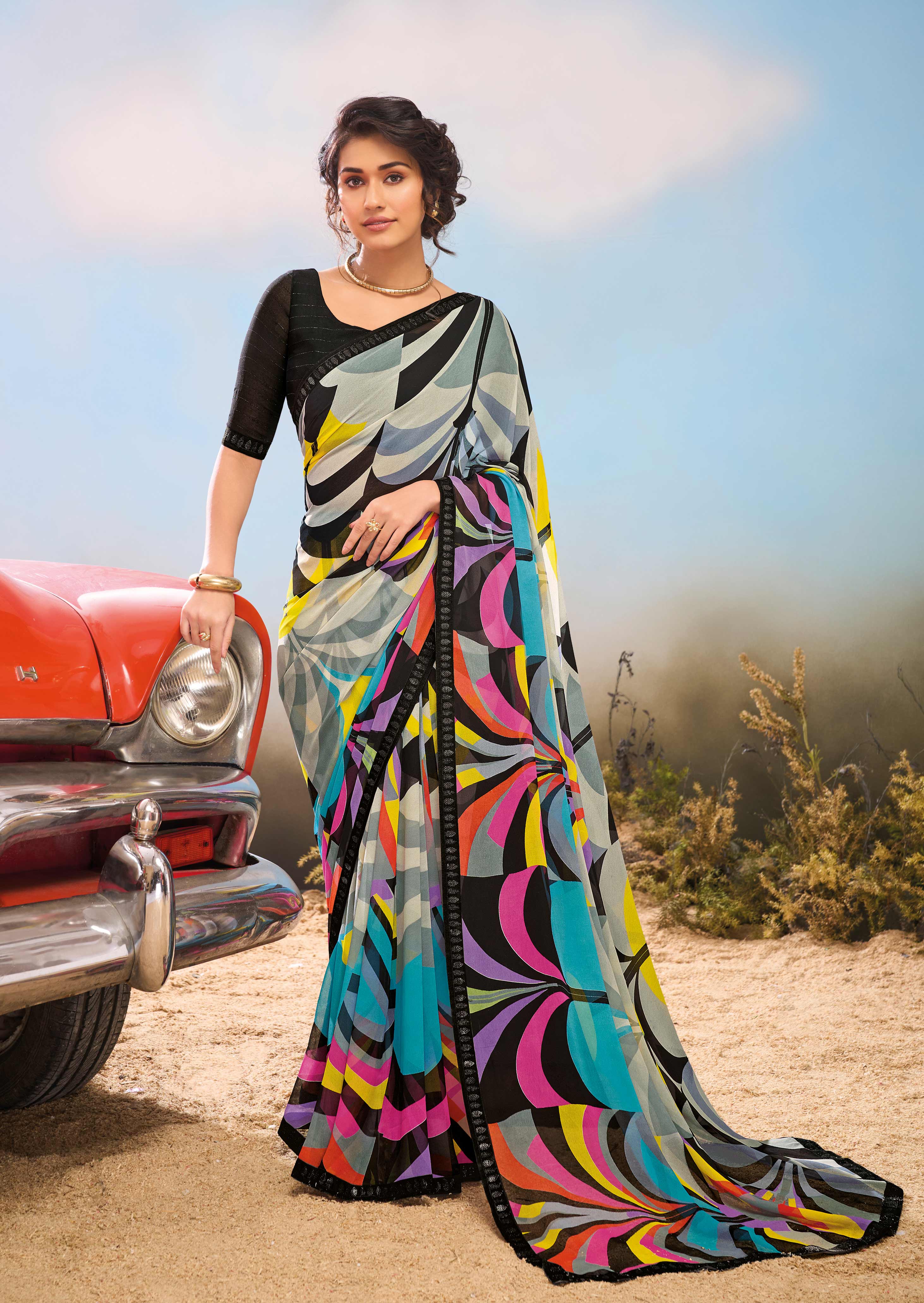 Laxmipati Baarish Abstract Printed Georgette Saree in Black Color with Unstitched Blouse