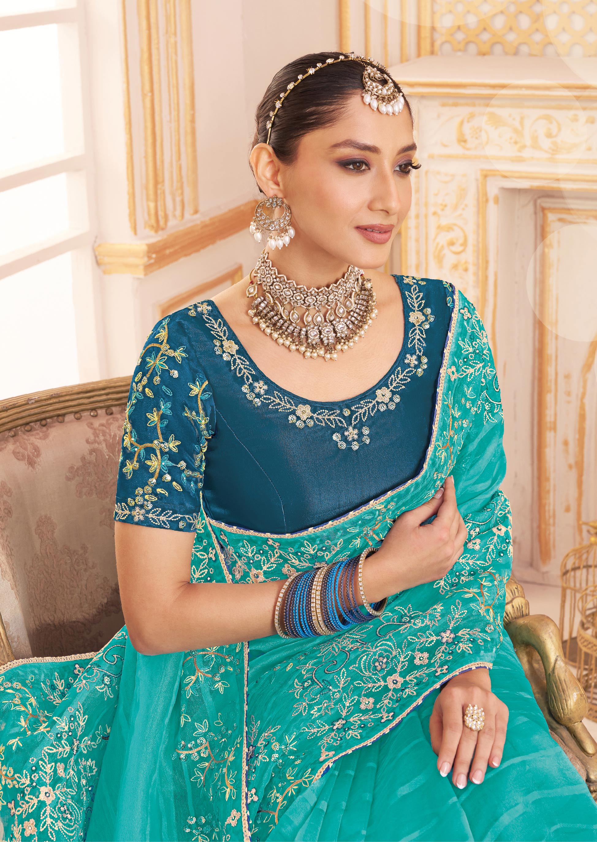 Laxmipati Chakor Teal Blue Tissue Organza Saree with Floral Embroidery