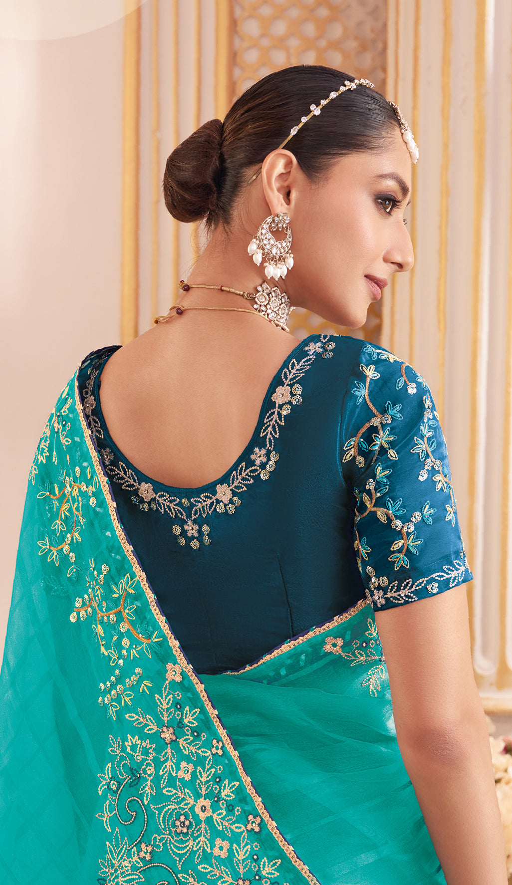 Laxmipati Chakor Teal Blue Tissue Organza Saree with Floral Embroidery