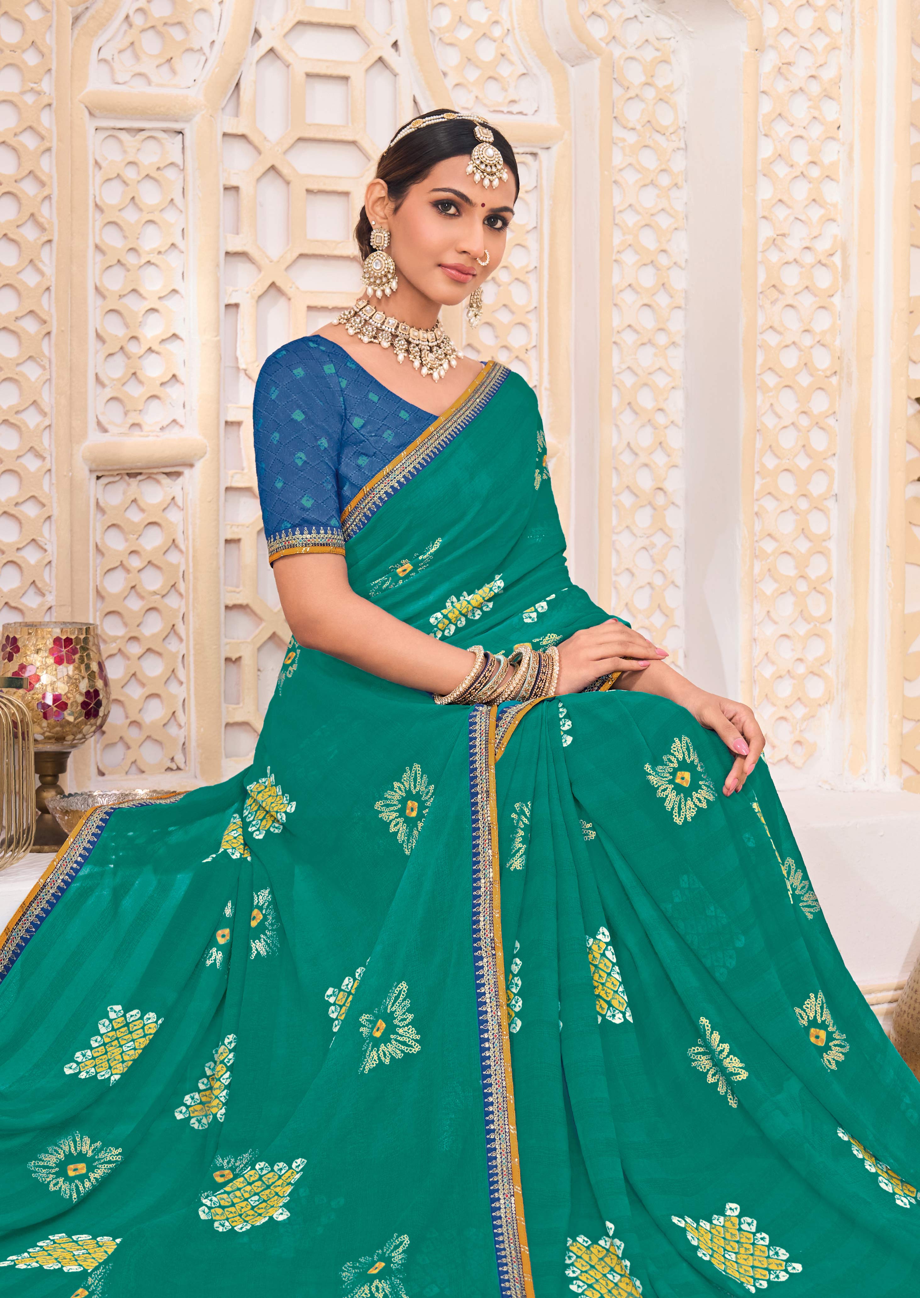 Laxmipati Ghoomar Teal Blue Georgette Floral Printed Saree