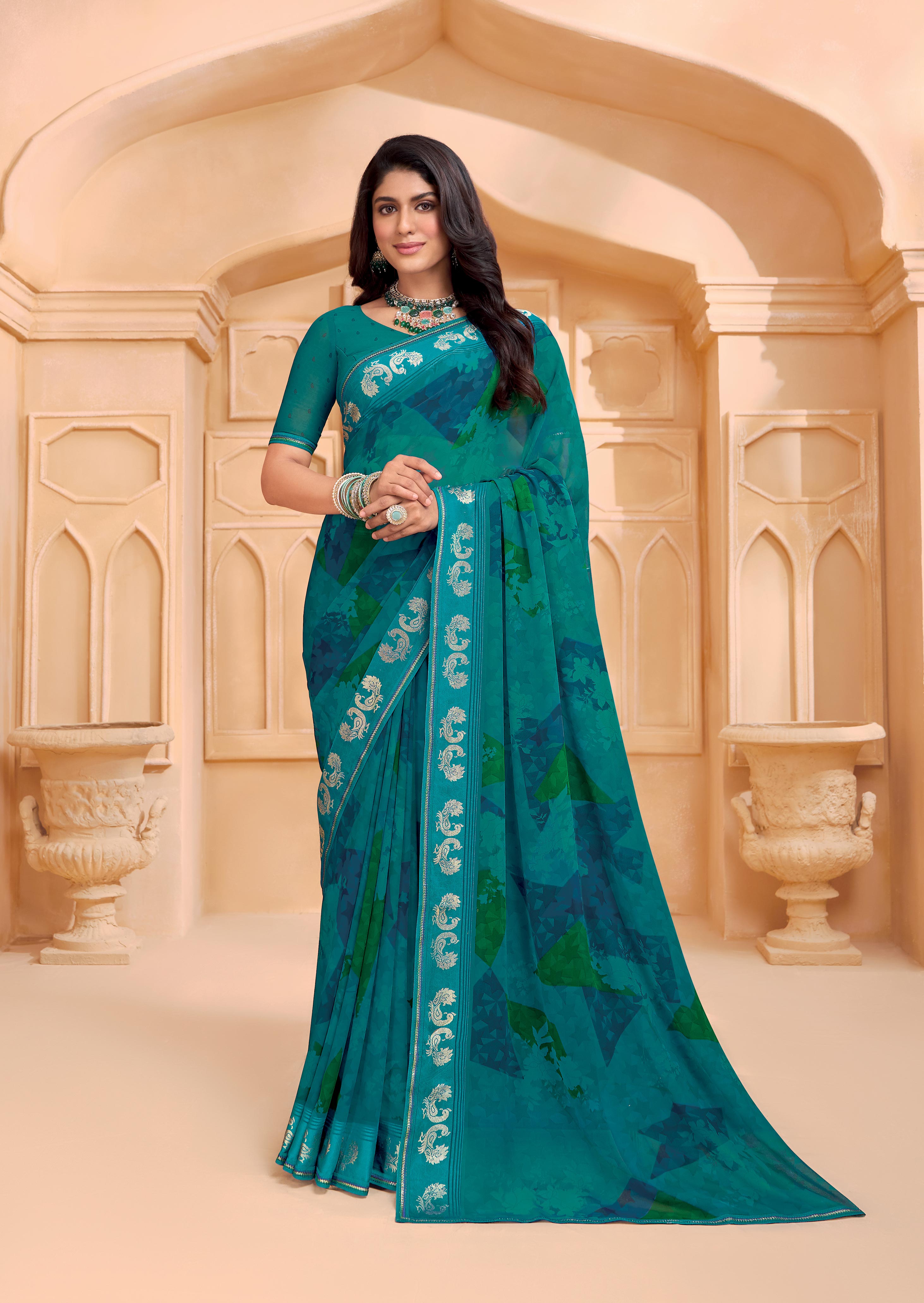 Laxmipati Tohfa Abstract Printed Georgette Saree in Teal Blue Color
