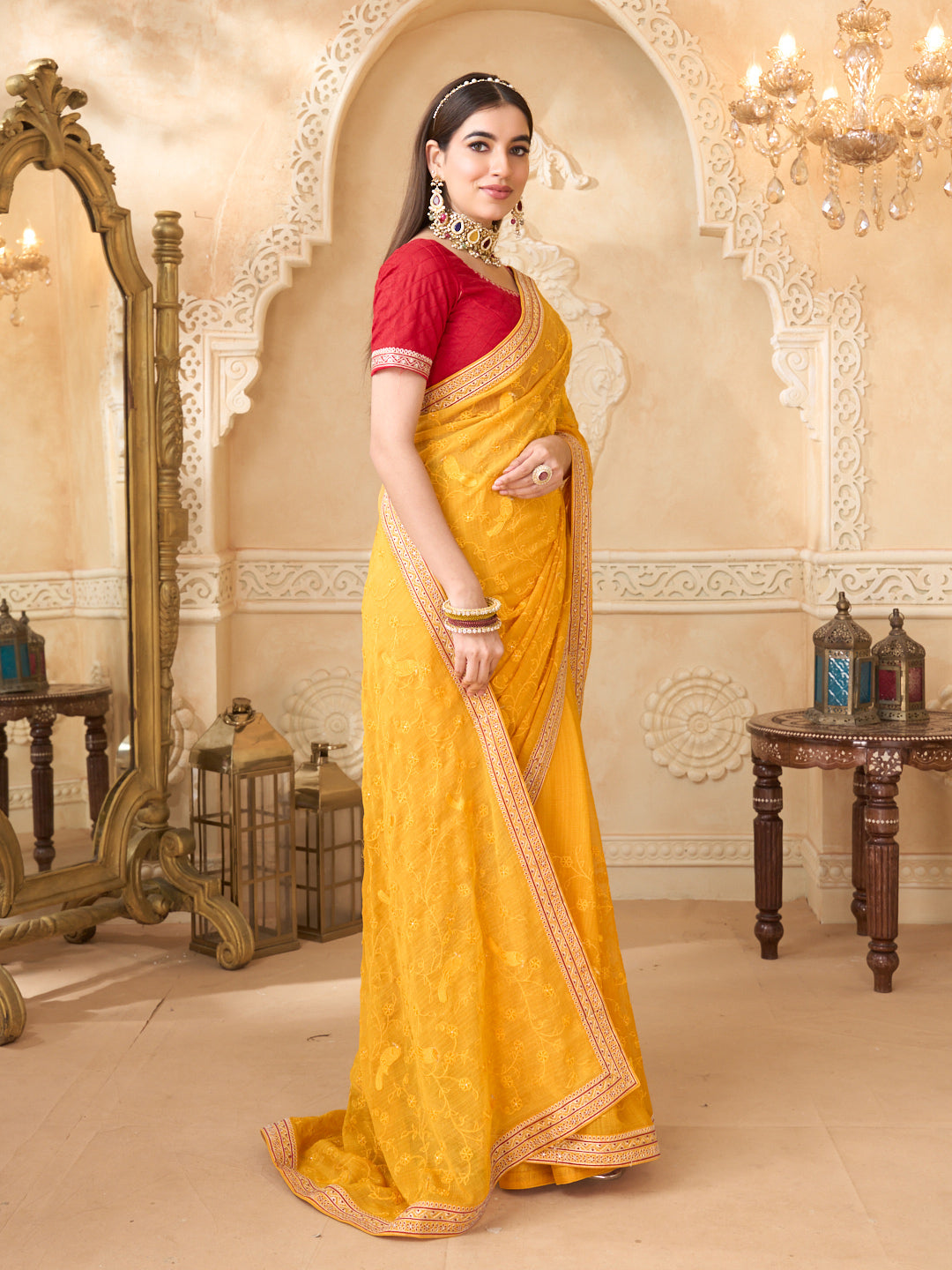 Mustard saree with red printed blouse