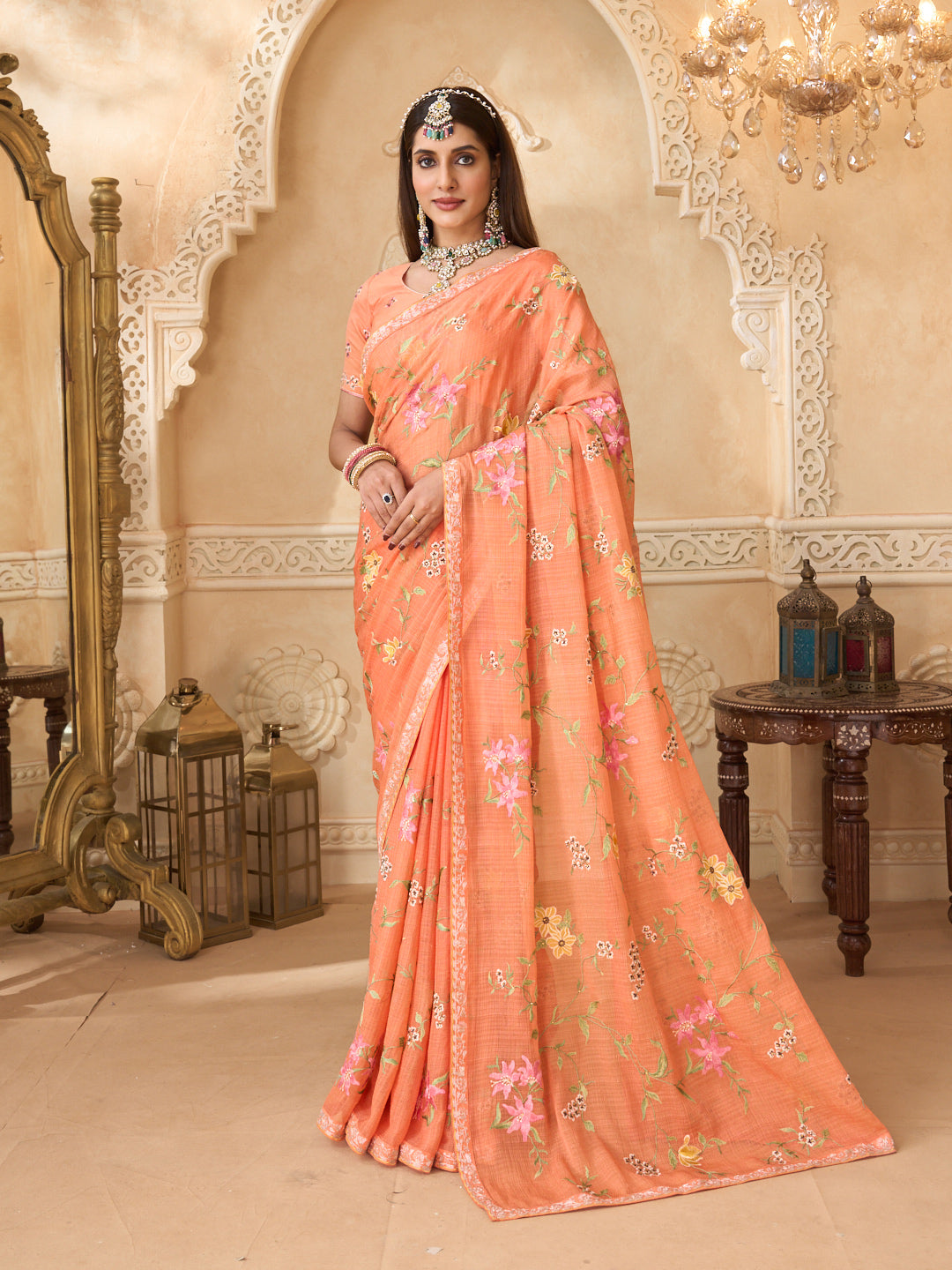 Orange chiffon saree with floral embroidery