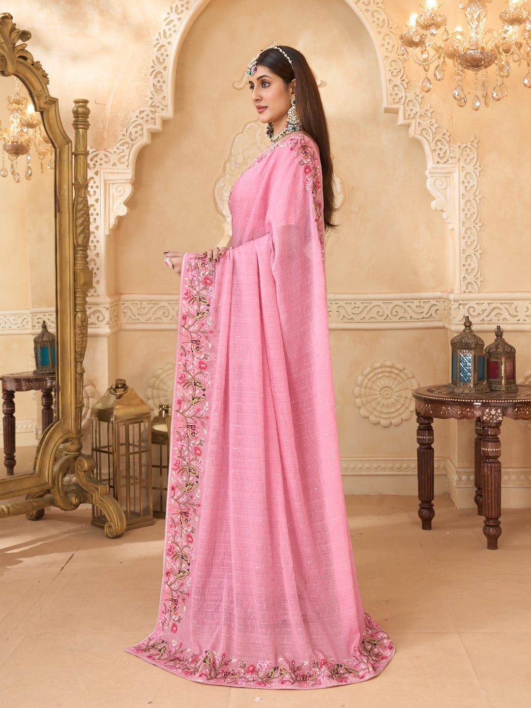 Pink saree with printed silk blouse