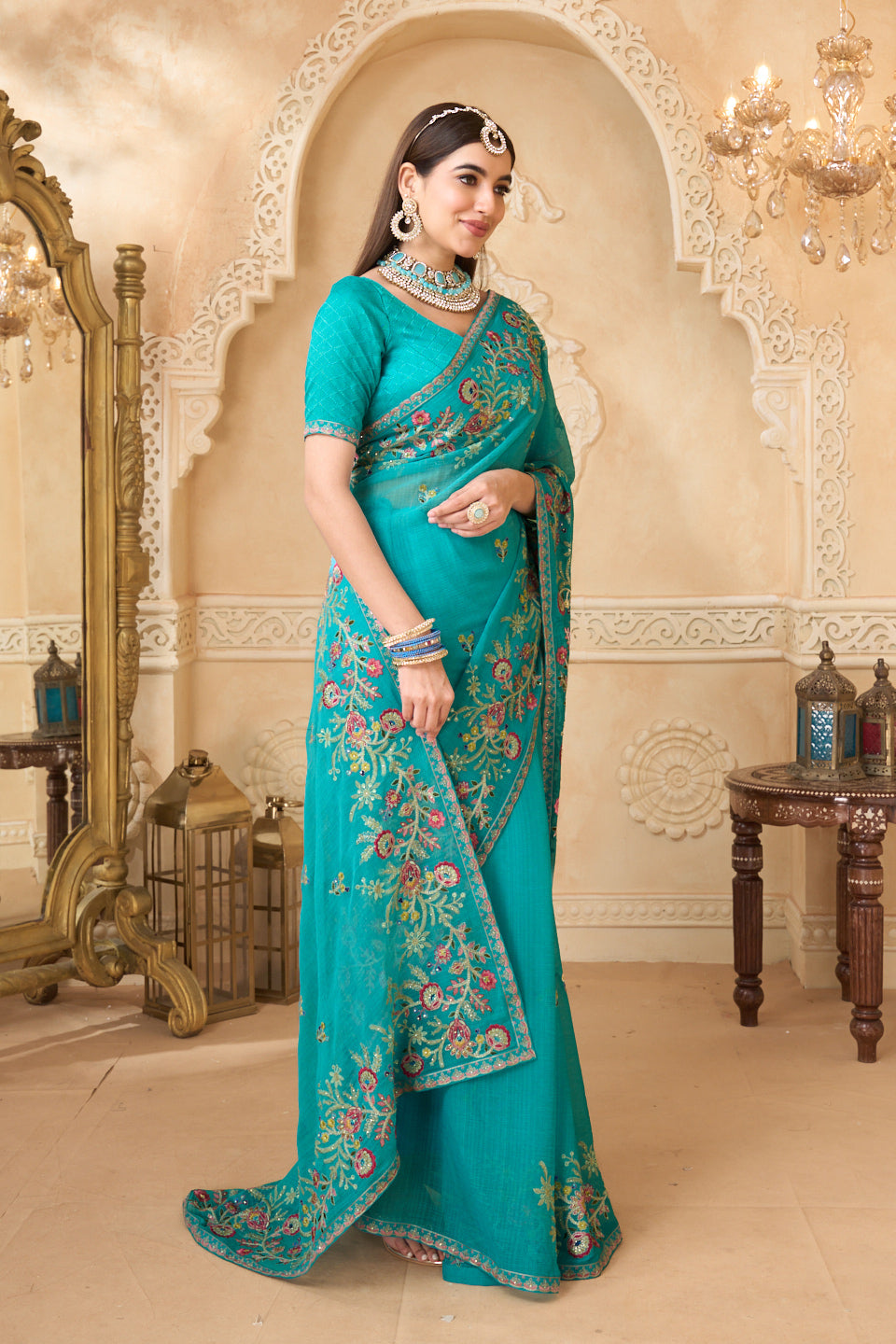 Teal blue saree with printed blouse