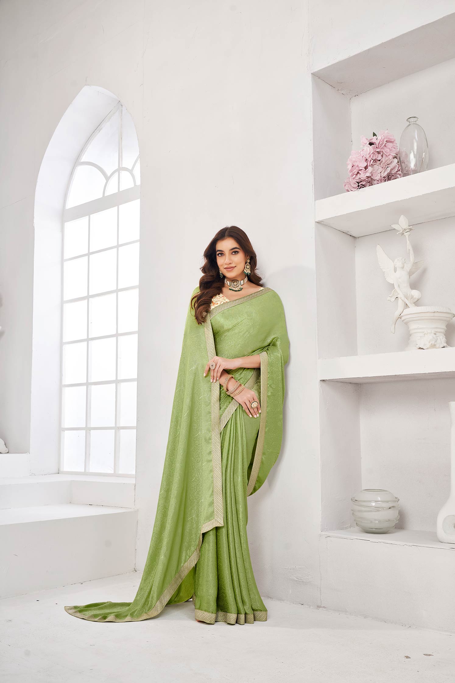 Mint green floral printed saree with lace