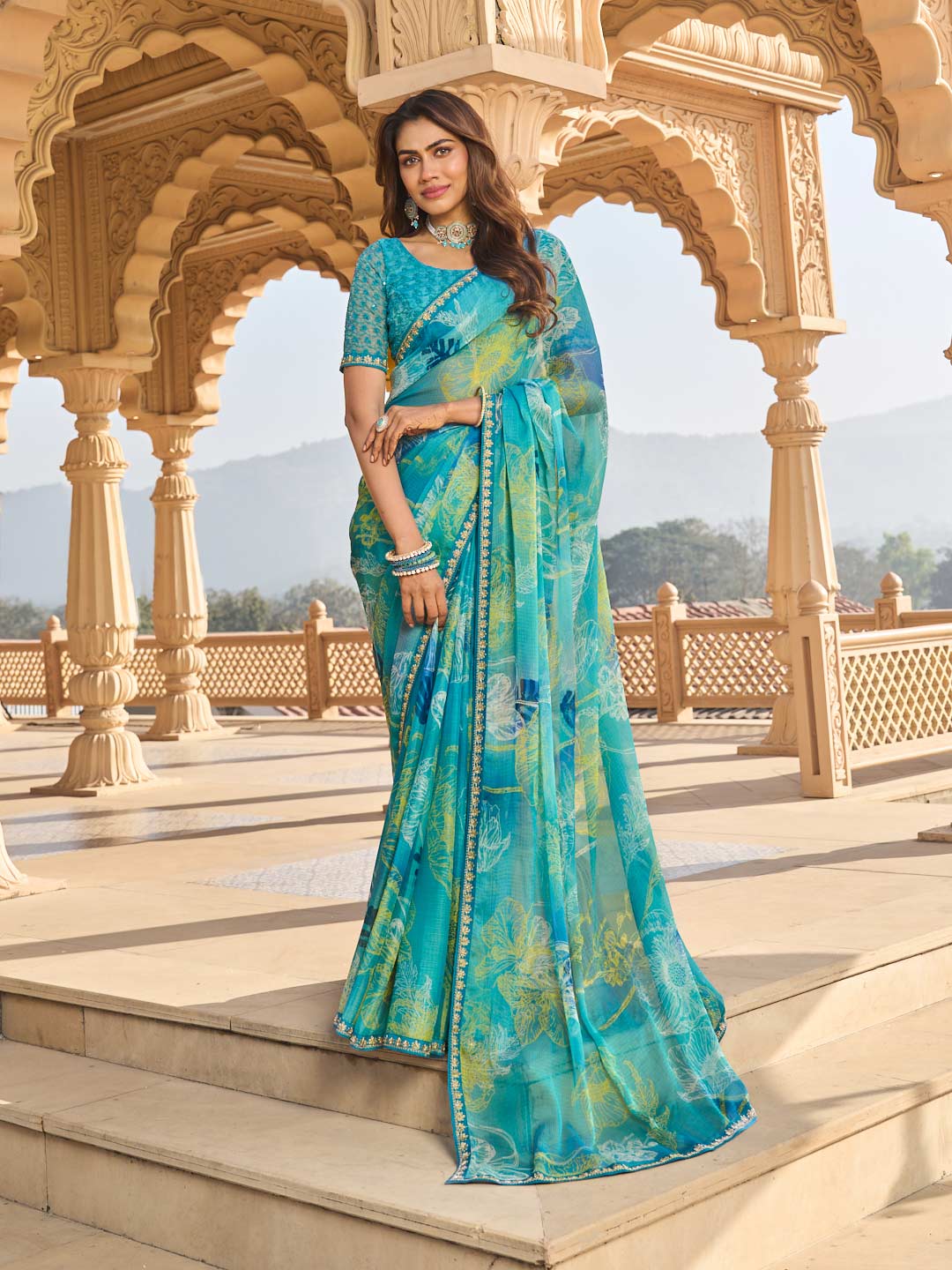 Teal blue printed chiffon saree