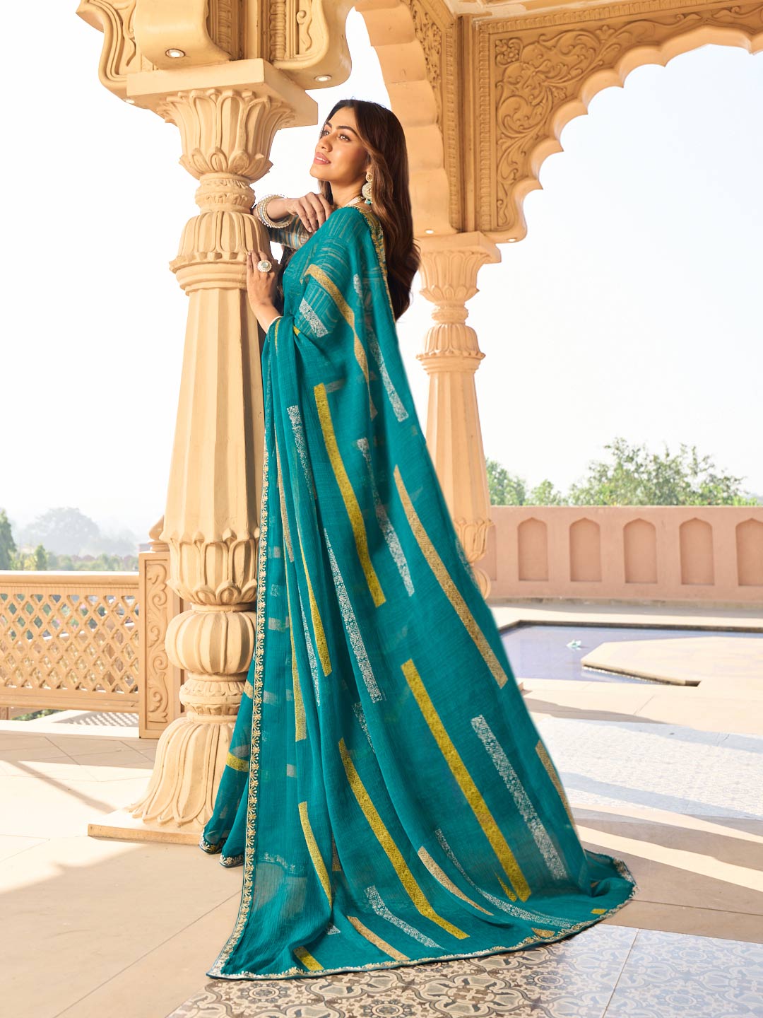 Teal blue saree with silk blouse