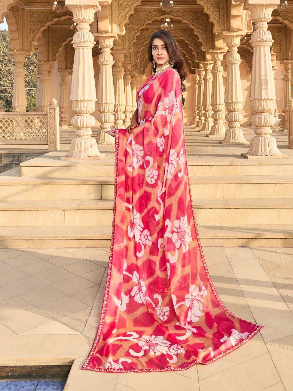 Floral print design on pink saree