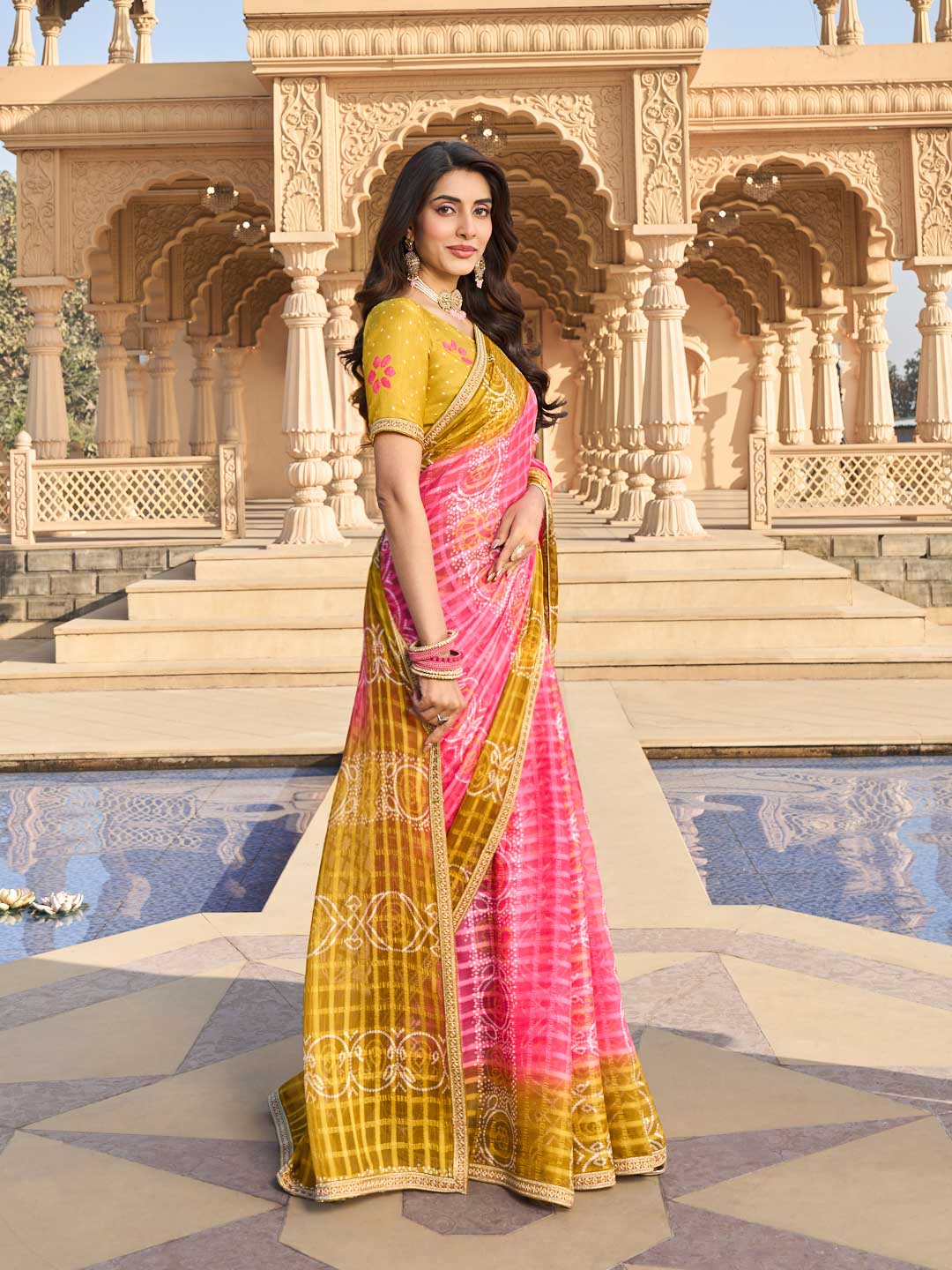 Floral print detail on pink chiffon saree