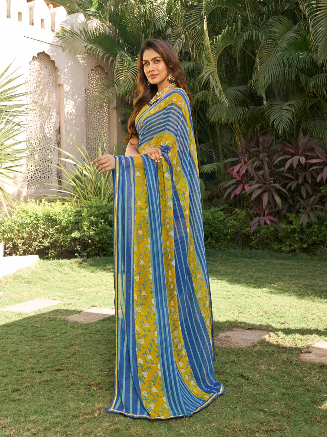 Navy blue georgette saree with mustard blouse
