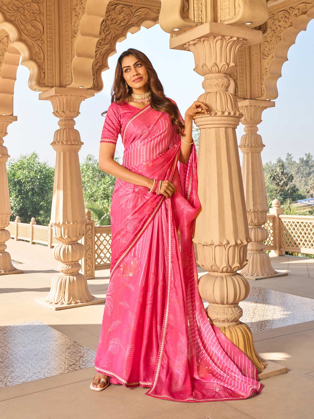 Floral design on pink chiffon saree
