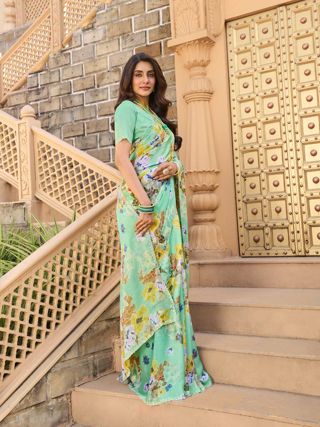Teal green silk saree with matching blouse