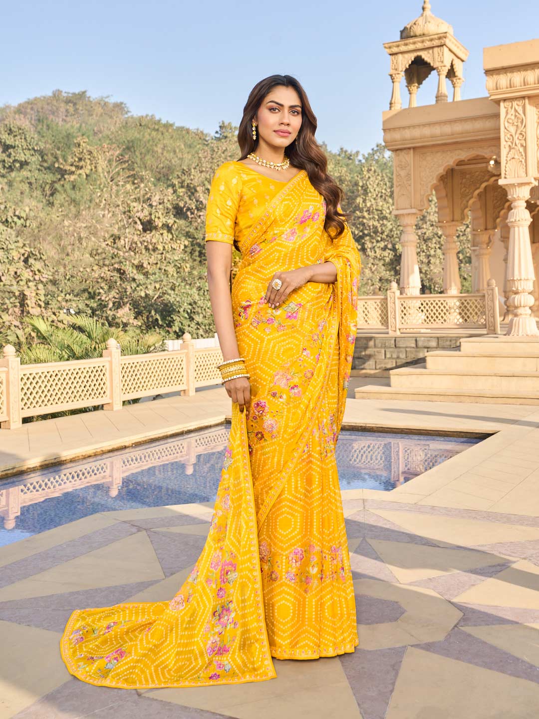 Floral design on yellow chiffon saree