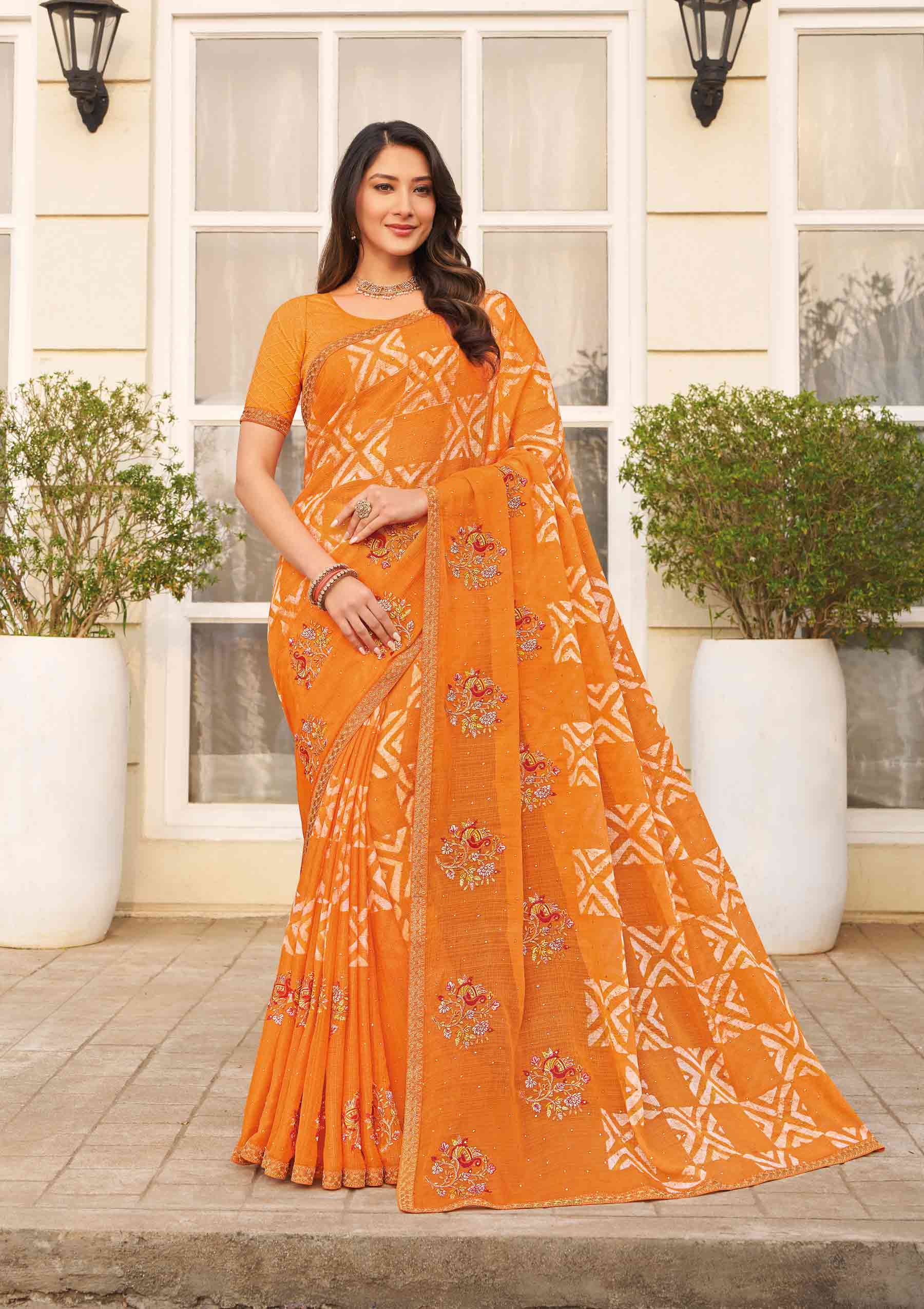 Orange embroidered chiffon saree