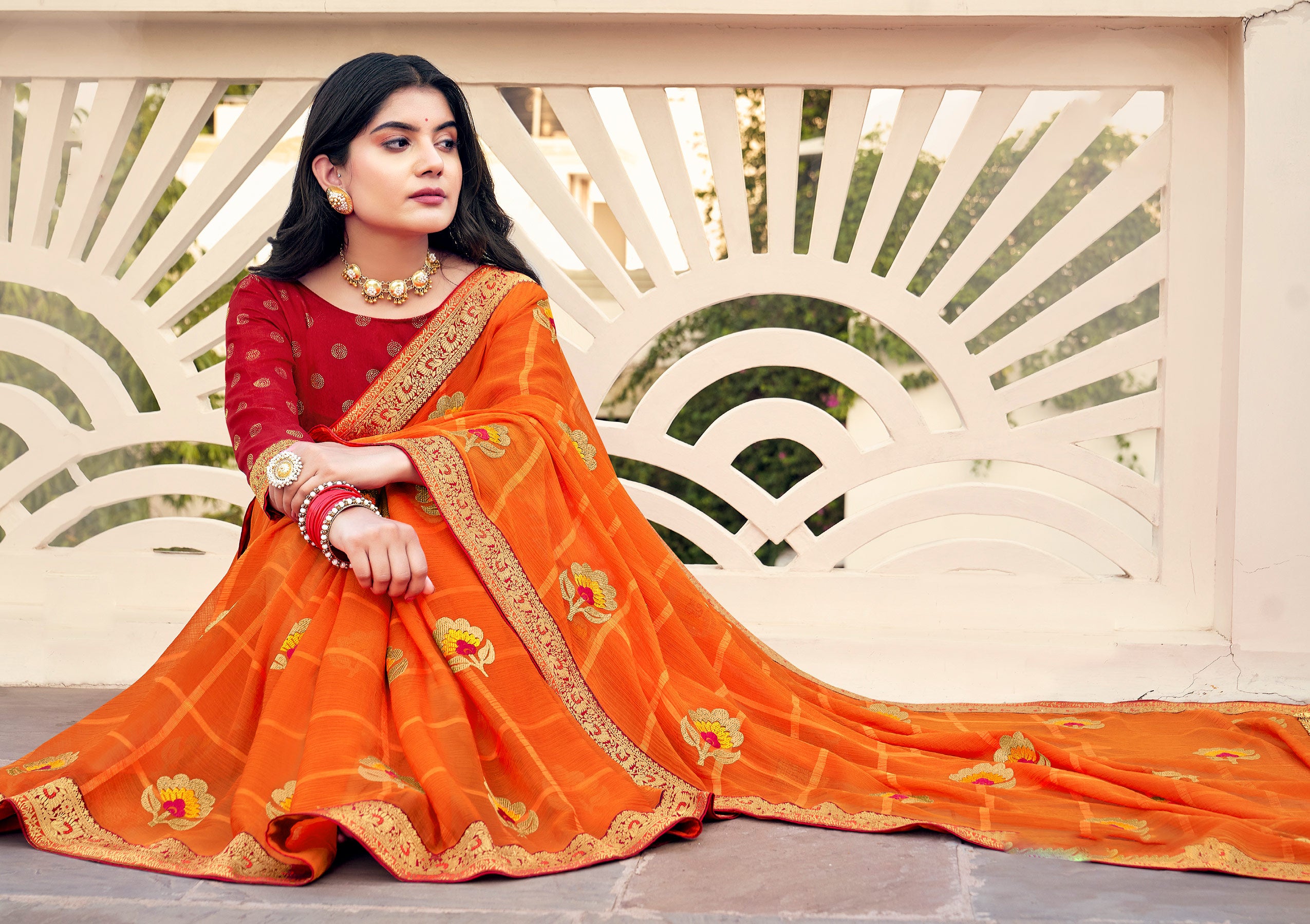 Laxmipati Ajrakh Floral Zari Motifs along with Brocade Border Chiffon Saree in Orange Color with Unstitched Blouse